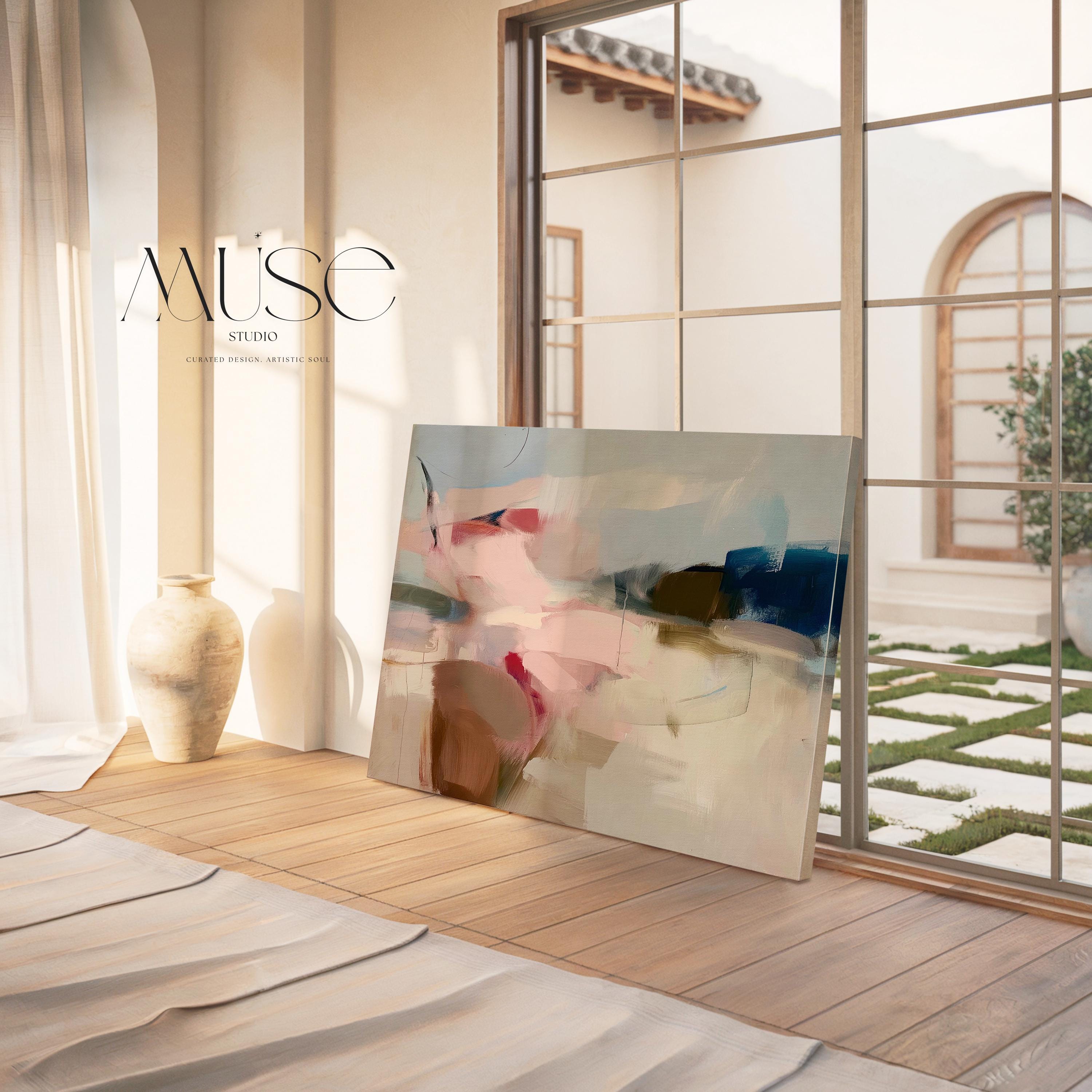 Abstract canvas wall art featuring soft blush, taupe, and navy tones with flowing brushstrokes and painterly texture. The horizontal composition evokes calm movement and balanced warmth, ideal for bedrooms or living rooms. Gallery-wrapped cotton canvas for a refined, ready-to-hang presentation.
