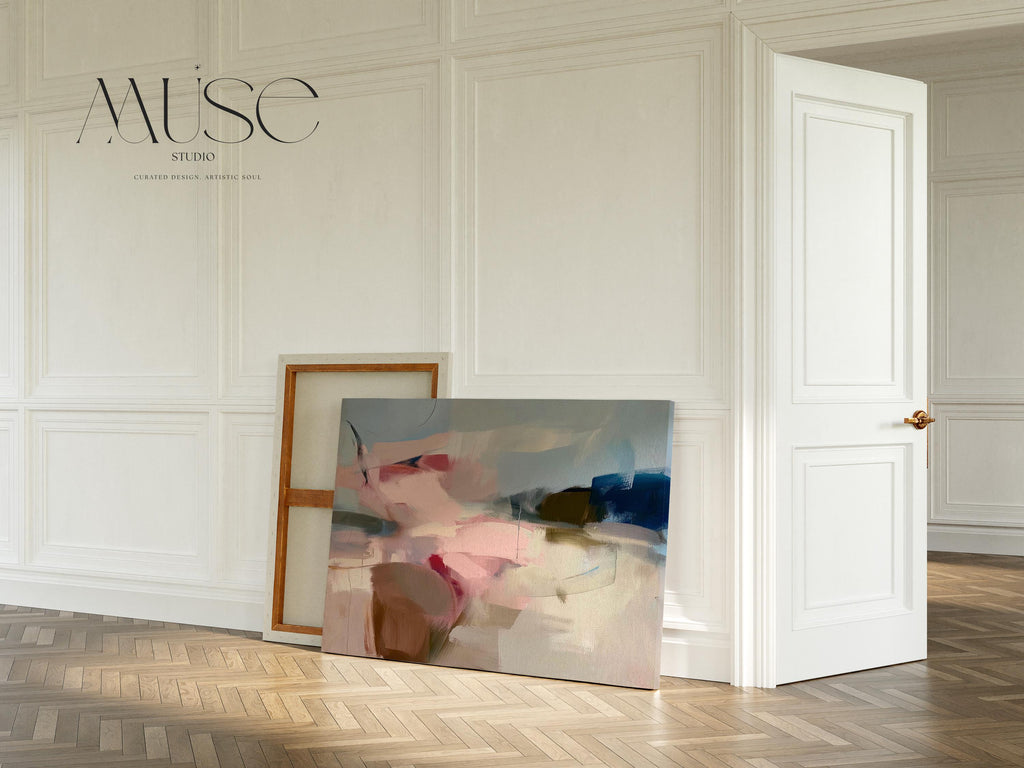 Abstract canvas wall art featuring soft blush, taupe, and navy tones with flowing brushstrokes and painterly texture. The horizontal composition evokes calm movement and balanced warmth, ideal for bedrooms or living rooms. Gallery-wrapped cotton canvas for a refined, ready-to-hang presentation.