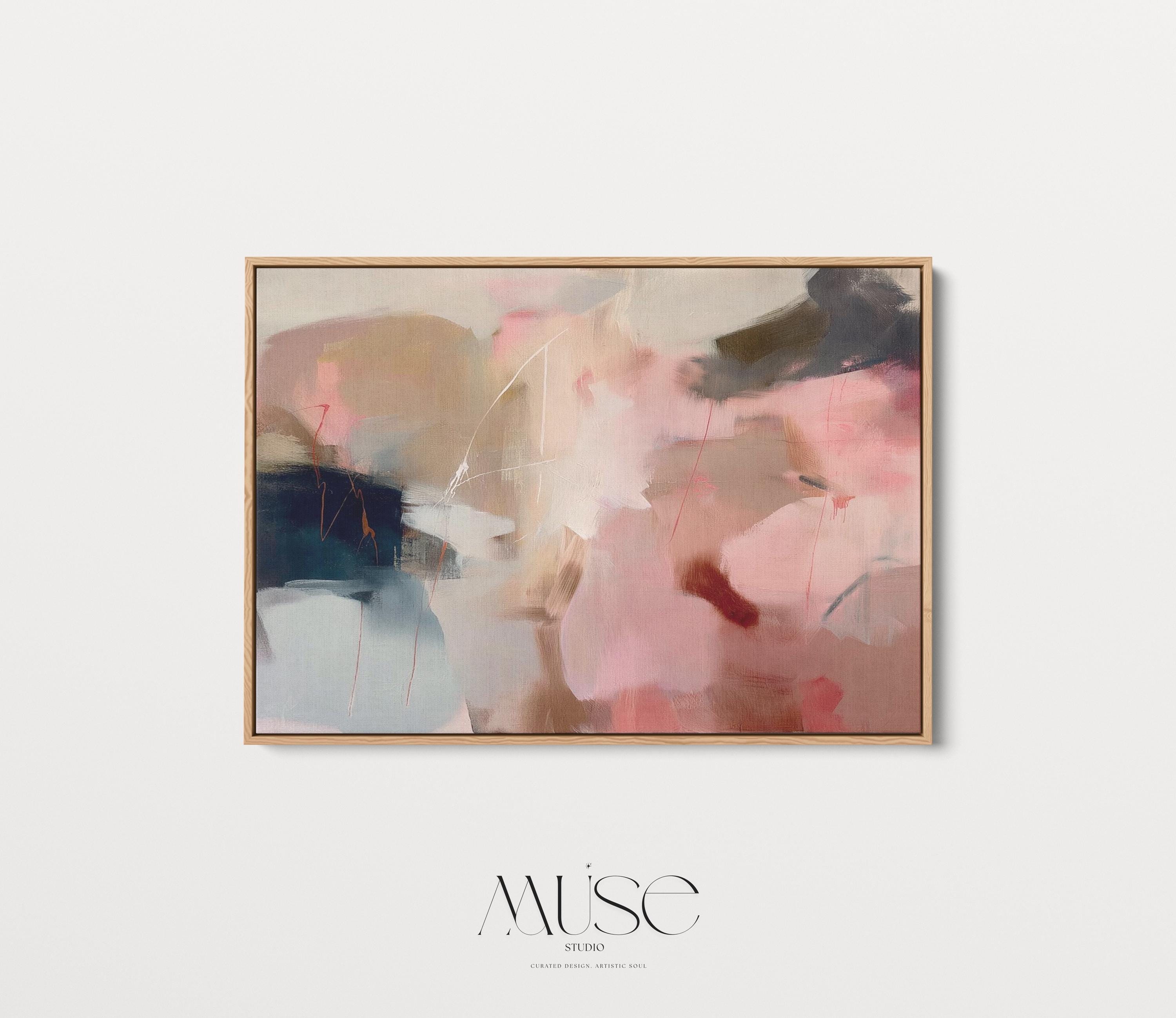 Horizontal abstract wall art in blush pink, beige, and navy tones framed in natural wood. This soft contemporary design blends fluid movement with a calm, elegant palette—ideal for warm minimalist or transitional interiors. Perfect for living rooms, bedrooms, or entryways seeking refined, serene decor. Available as a framed canvas wall art, gallery-wrapped canvas, or fine art poster print.