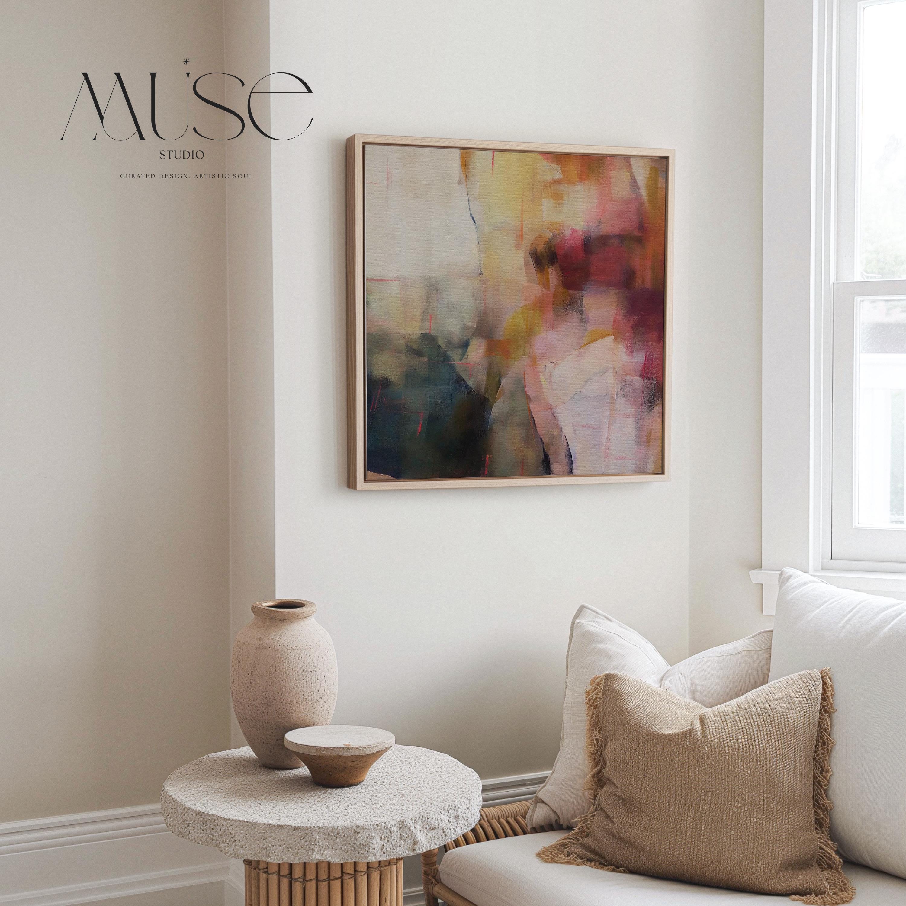 Square abstract wall art featuring rich plum, ochre, blush, and navy hues in a softly layered composition. This framed canvas adds warmth and elegance to transitional and soft contemporary interiors, ideal for offices, living rooms, or reading spaces. The artwork’s textured depth and balanced palette make it perfect for creating a sophisticated, curated atmosphere. Available as a framed canvas wall art, gallery-wrapped canvas, or fine art poster print.