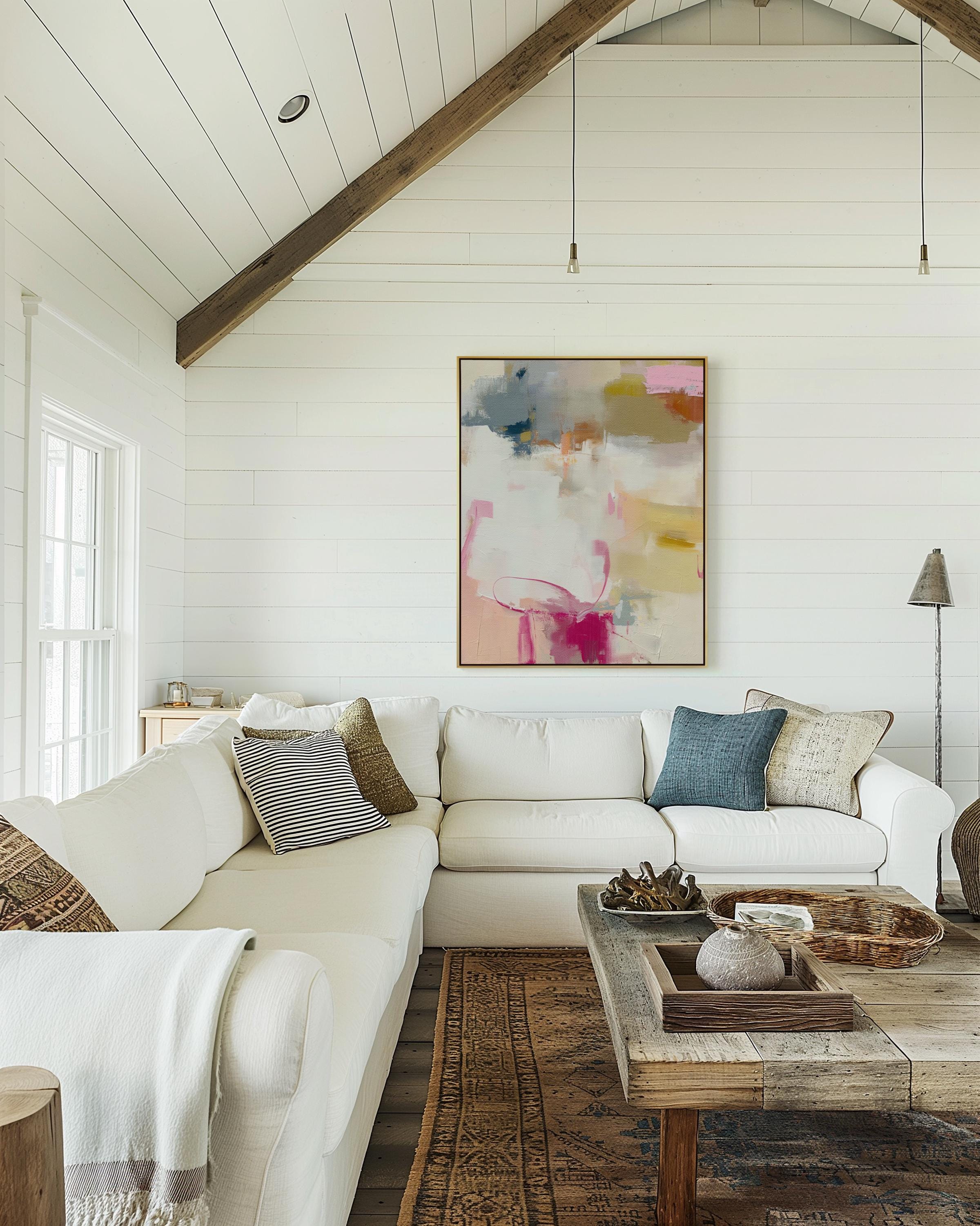 Vertical abstract canvas wall art featuring blush pink, gold, taupe, and soft blue hues in a soft contemporary color pop palette. The artwork adds warmth and elegance to modern interiors, perfect for living rooms, bedrooms, or entryways. Its layered brushwork and inviting tones create a sophisticated, designer look. Available as a gallery-wrapped canvas, framed canvas, or fine art poster print.