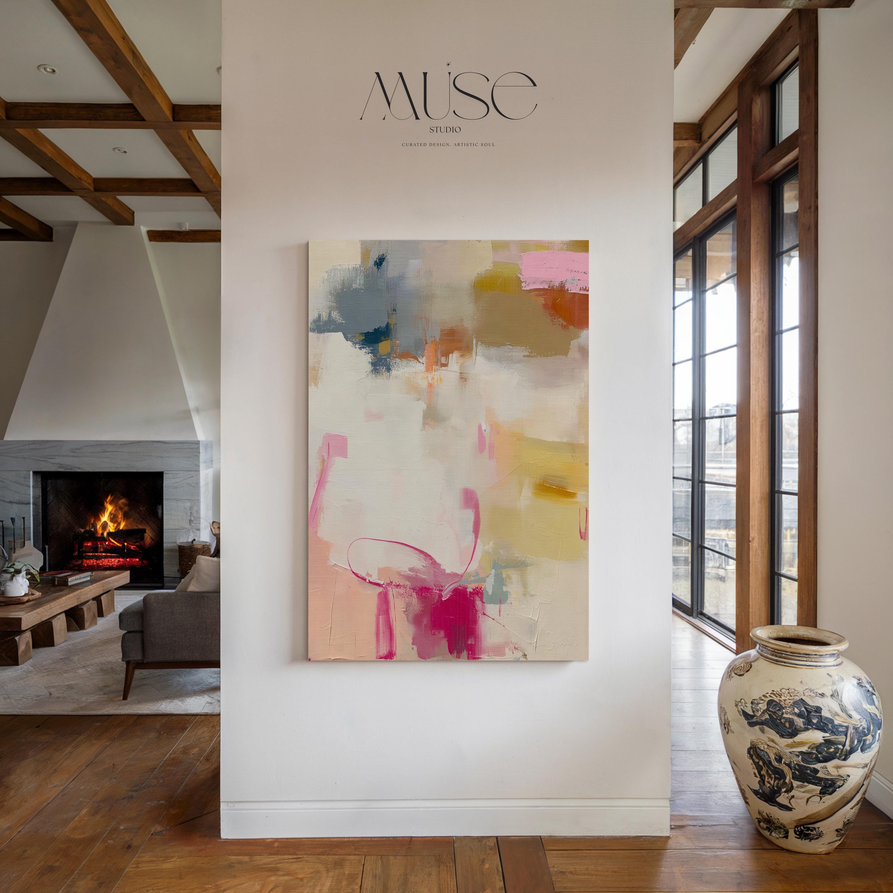 Vertical abstract canvas wall art featuring blush pink, gold, taupe, and soft blue hues in a soft contemporary color pop palette. The artwork adds warmth and elegance to modern interiors, perfect for living rooms, bedrooms, or entryways. Its layered brushwork and inviting tones create a sophisticated, designer look. Available as a gallery-wrapped canvas, framed canvas, or fine art poster print.