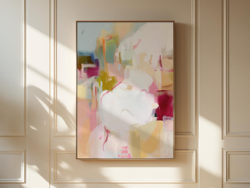 Vertical framed abstract wall art featuring pink, cream, olive, and berry hues. Soft brushwork creates a calm yet uplifting mood, ideal for pastel botanical and soft contemporary interiors. Perfect for living rooms, bedrooms, or entryways, the artwork adds warmth and modern refinement. Each framed wall art piece is crafted with a sleek wood frame, clean lines, and a gallery-quality finish, ready to hang for a polished designer look.