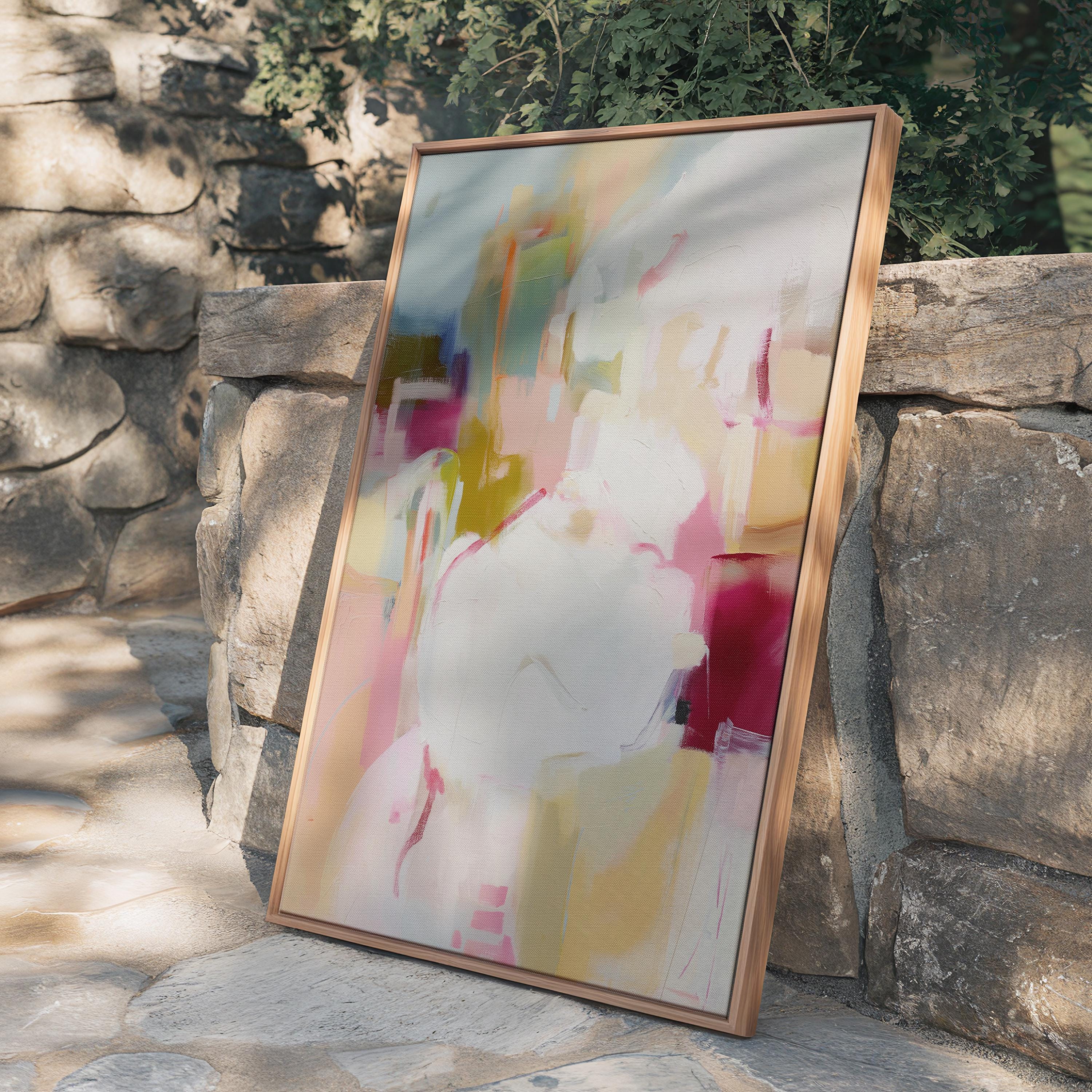 Vertical framed abstract wall art featuring pink, cream, olive, and berry hues. Soft brushwork creates a calm yet uplifting mood, ideal for pastel botanical and soft contemporary interiors. Perfect for living rooms, bedrooms, or entryways, the artwork adds warmth and modern refinement. Each framed wall art piece is crafted with a sleek wood frame, clean lines, and a gallery-quality finish, ready to hang for a polished designer look.