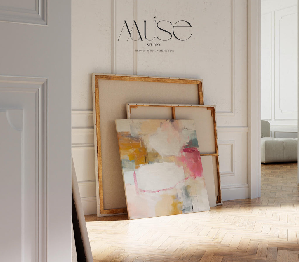 Square abstract canvas wall art in warm pink, ochre, teal, and white tones. The layered brushwork and soft composition bring light and warmth to soft contemporary or pastel botanical interiors. Perfect for living rooms, bedrooms, or modern open spaces, this piece adds refined texture and color. Gallery-wrapped canvas wall art with a smooth, fine-textured finish, ready to hang for a clean, designer look.