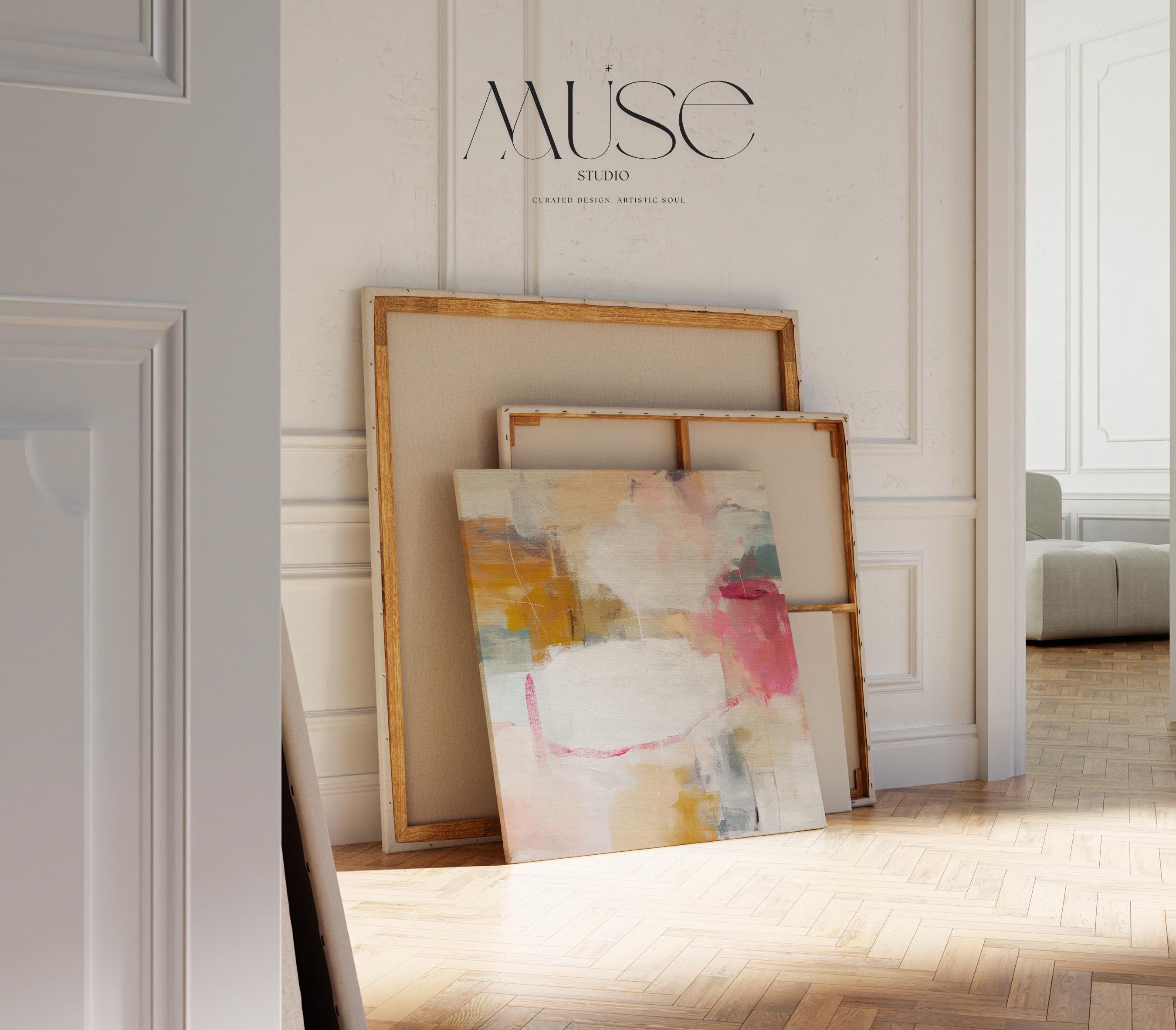 Square abstract canvas wall art in warm pink, ochre, teal, and white tones. The layered brushwork and soft composition bring light and warmth to soft contemporary or pastel botanical interiors. Perfect for living rooms, bedrooms, or modern open spaces, this piece adds refined texture and color. Gallery-wrapped canvas wall art with a smooth, fine-textured finish, ready to hang for a clean, designer look.
