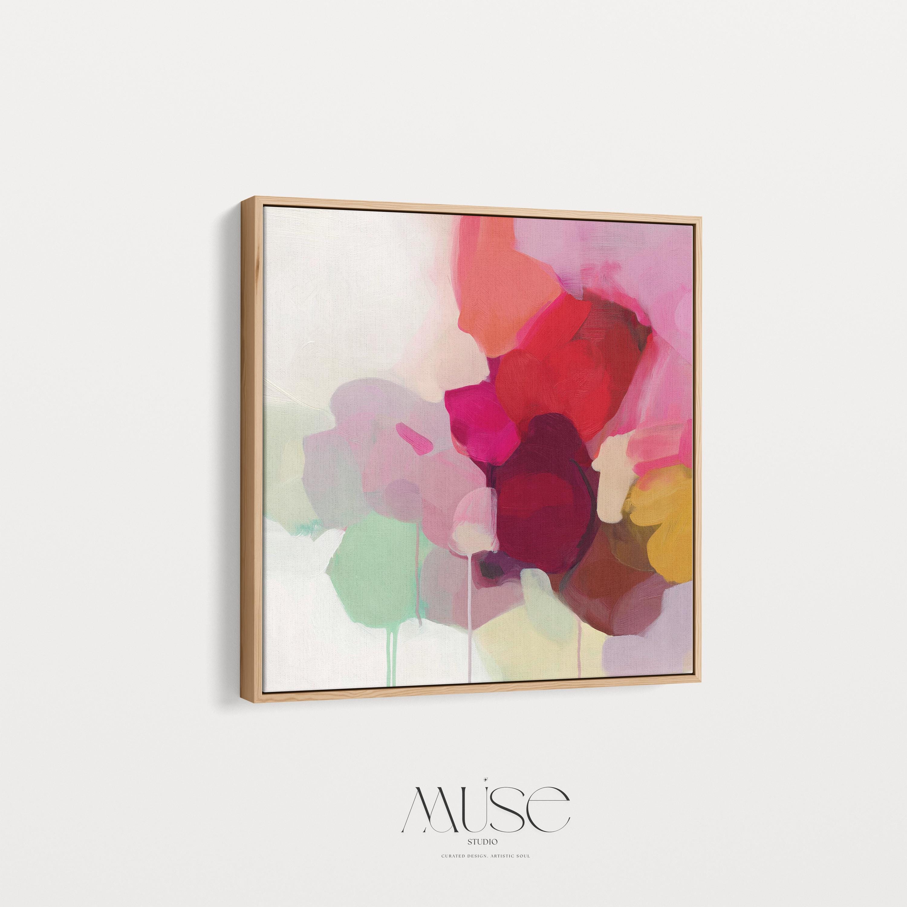 Large square abstract wall art in vivid red, pink, plum, and green hues with layered brushwork and soft tonal transitions. Designed for Color Pop interiors, this vibrant canvas creates a statement centerpiece in living rooms or modern spaces. Gallery-wrapped canvas wall art with fine texture and a clean, frameless presentation, ready to hang and elevate any room with bright, joyful color.