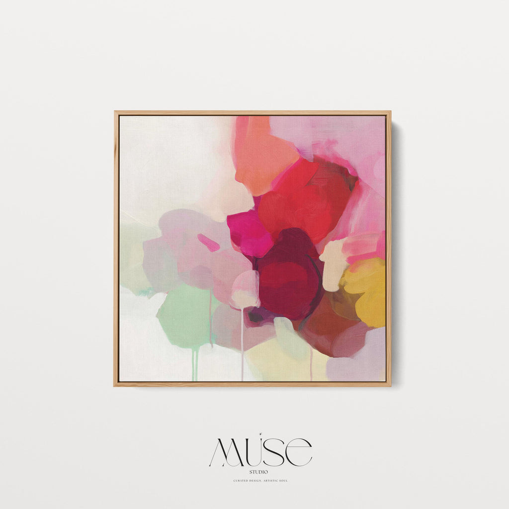 Large square abstract wall art in vivid red, pink, plum, and green hues with layered brushwork and soft tonal transitions. Designed for Color Pop interiors, this vibrant canvas creates a statement centerpiece in living rooms or modern spaces. Gallery-wrapped canvas wall art with fine texture and a clean, frameless presentation, ready to hang and elevate any room with bright, joyful color.