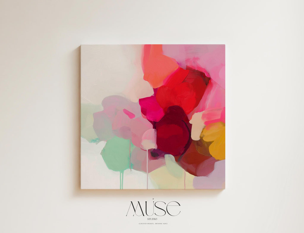 Large square abstract wall art featuring crimson, rose, plum, and soft green tones. This vibrant piece blends fluid color transitions with expressive brushwork, perfect for Color Pop or Soft Contemporary interiors. Ideal for living rooms or creative spaces. Gallery-wrapped canvas wall art with a fine-textured surface, ready to hang and infuse any room with bold, joyful color.