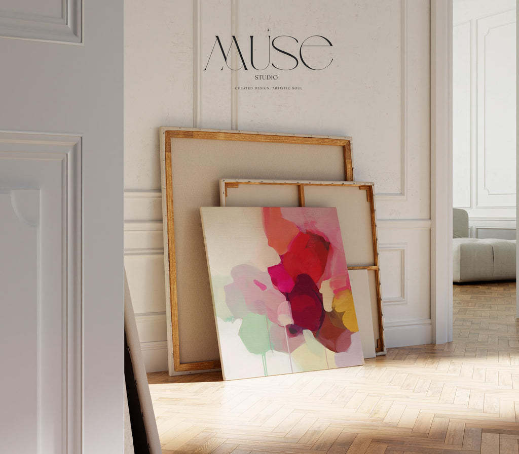 Large square abstract wall art featuring crimson, rose, plum, and soft green tones. This vibrant piece blends fluid color transitions with expressive brushwork, perfect for Color Pop or Soft Contemporary interiors. Ideal for living rooms or creative spaces. Gallery-wrapped canvas wall art with a fine-textured surface, ready to hang and infuse any room with bold, joyful color.