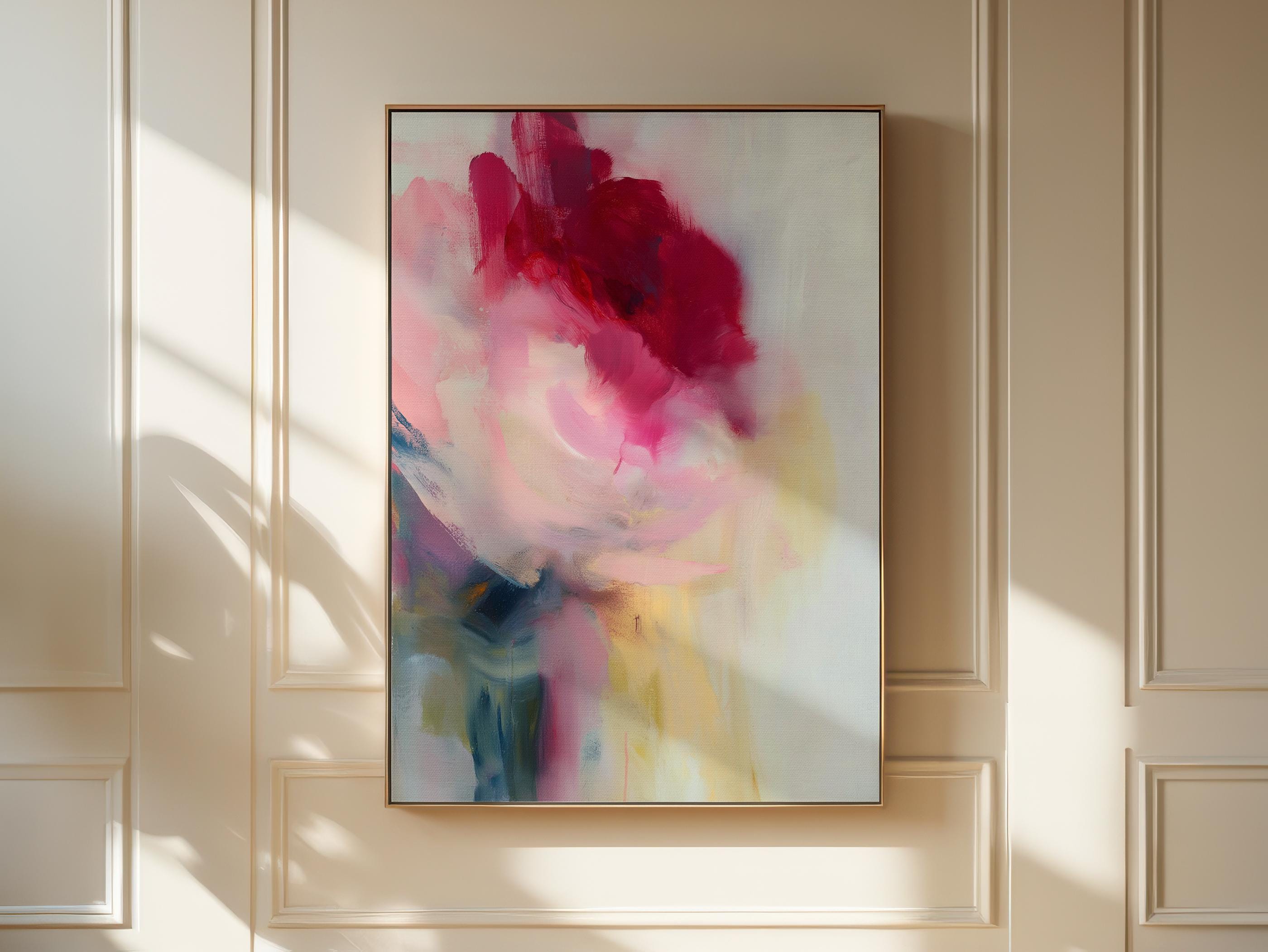 Vertical abstract wall art in soft pink, rose, and misty blue tones, blending painterly layers with an airy, luminous finish. Ideal for bedrooms or entryways, this soft contemporary design adds tranquility and subtle color. Floater framed in FSC-certified wood with a natural finish, printed on archival cotton-blend canvas for premium wall decor.