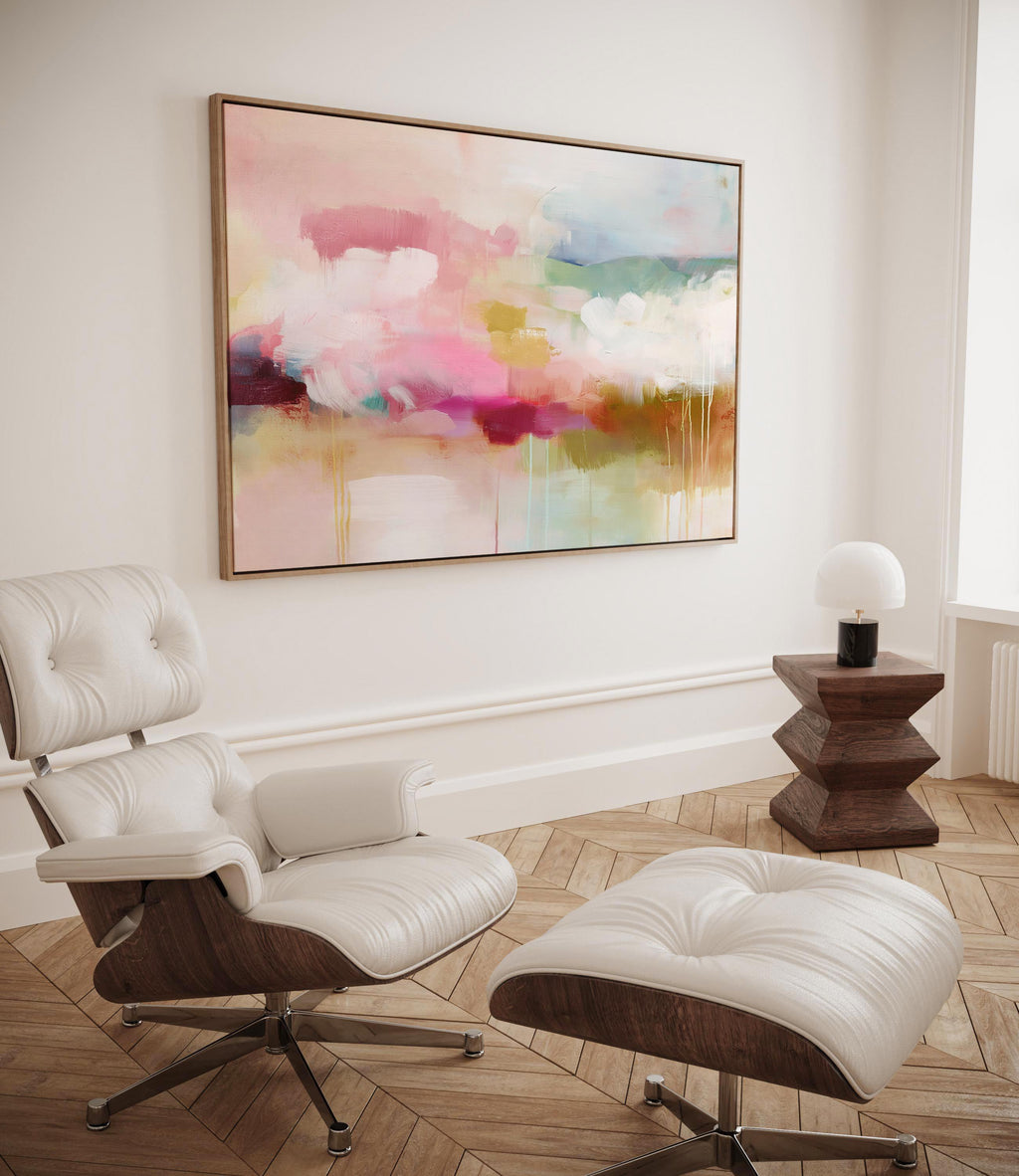 Horizontal framed abstract wall art blending blush pink, sage green, and golden umber with soft painterly drips. A warm minimalist design that evokes natural horizons and organic calm, ideal for living rooms, dining spaces, or design studios. Floater framed in FSC-certified wood with archival cotton-blend canvas for a gallery-quality presentation.