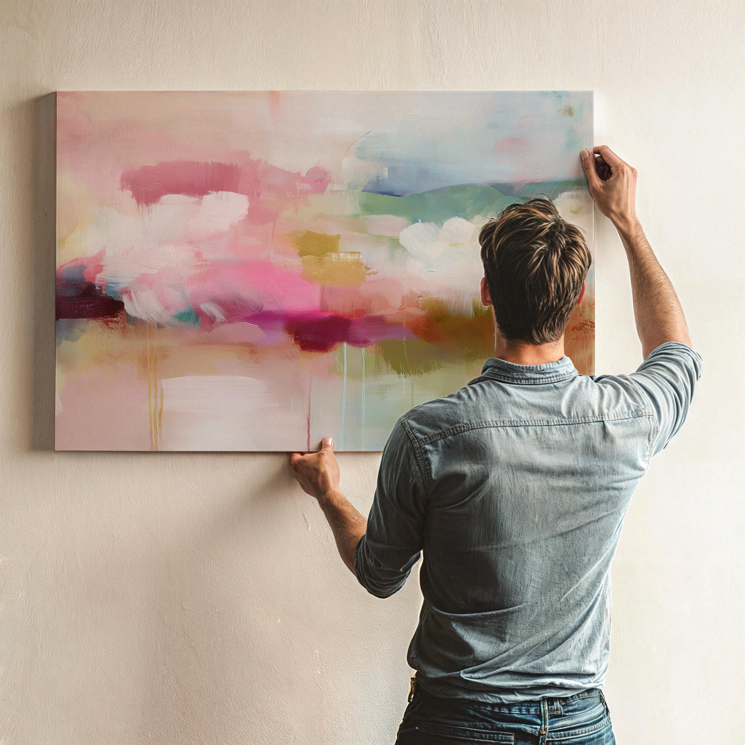 Horizontal abstract wall art featuring soft pink, sage green, and warm beige tones with painterly drips and horizon-inspired layers. Ideal for warm minimalist or nature-inspired interiors, this large canvas artwork adds tranquility and refined depth to living rooms, offices, or bedrooms. Printed on archival cotton-blend canvas and hand-stretched for a gallery-quality finish.