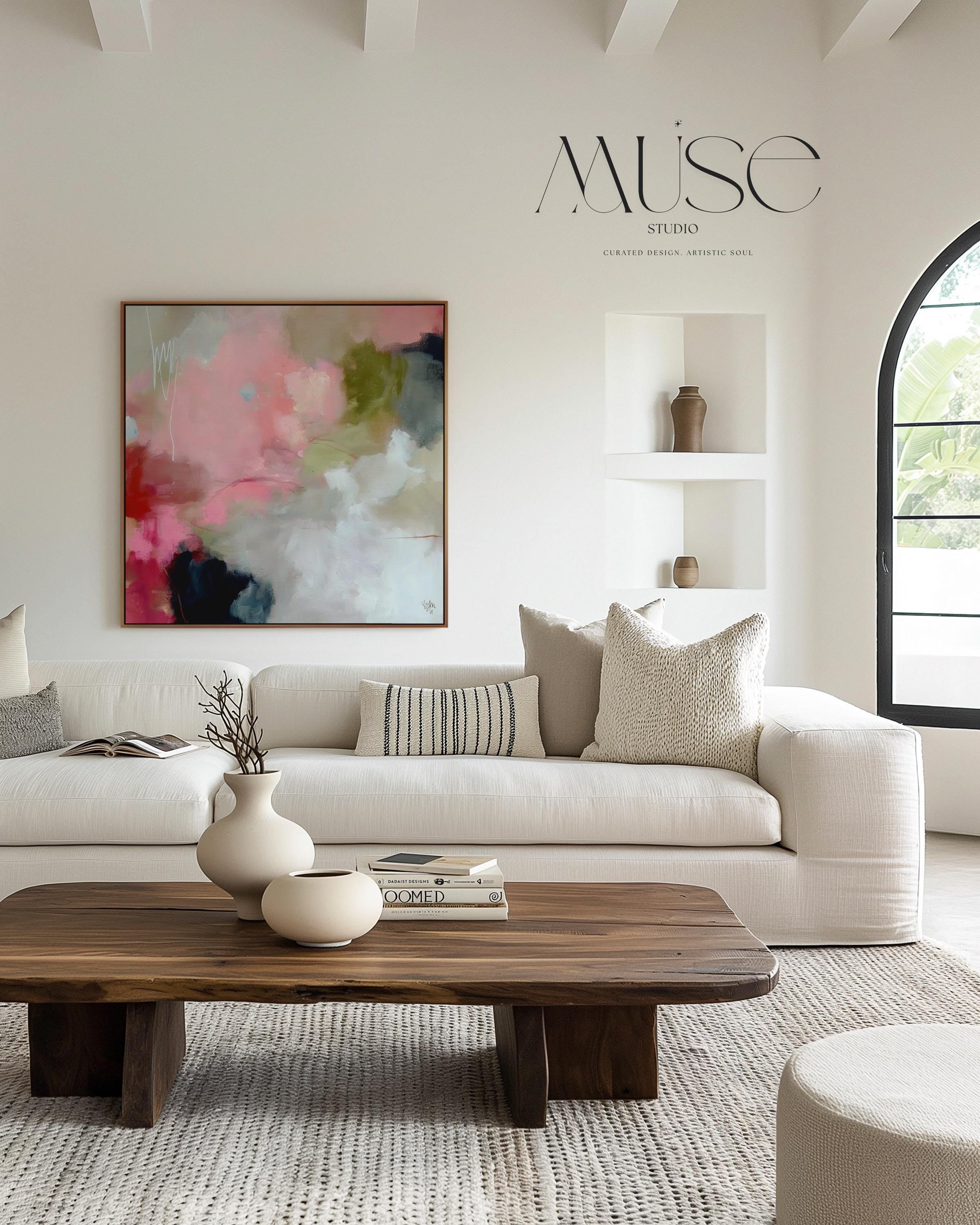 Square framed abstract wall art featuring coral pink, olive green, and soft neutral tones in a painterly composition. Ideal for Soft Contemporary interiors, this warm and expressive artwork complements dining rooms, offices, and statement walls. Floater framed in FSC-certified wood and printed on archival cotton-blend canvas for a refined, gallery-quality finish.