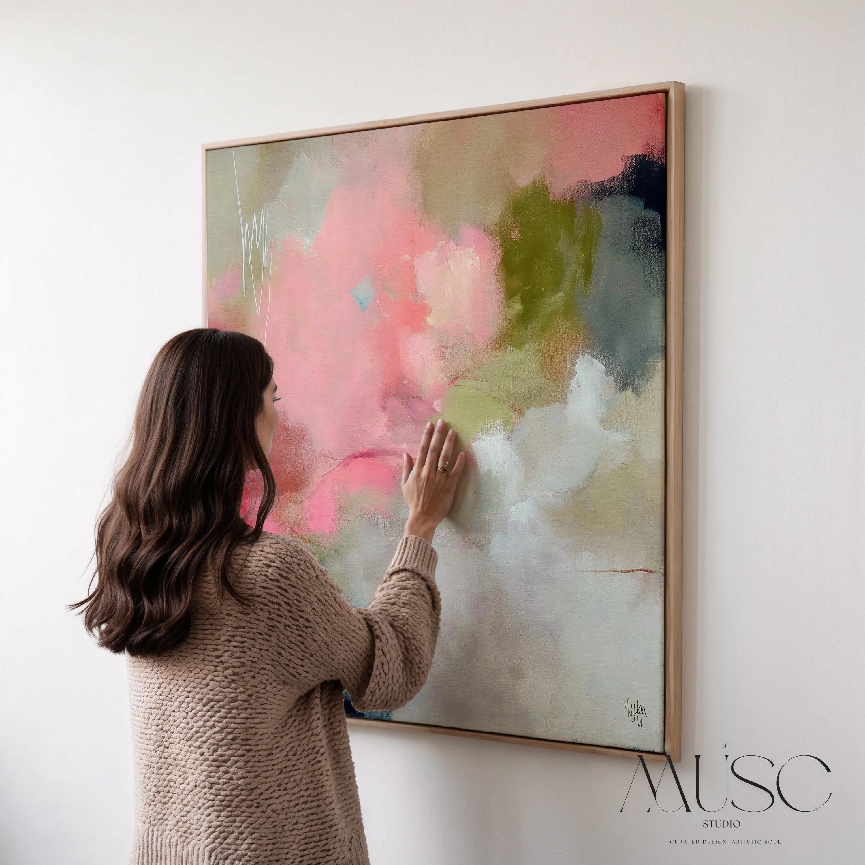 Square framed abstract wall art featuring coral pink, olive green, and soft neutral tones in a painterly composition. Ideal for Soft Contemporary interiors, this warm and expressive artwork complements dining rooms, offices, and statement walls. Floater framed in FSC-certified wood and printed on archival cotton-blend canvas for a refined, gallery-quality finish.