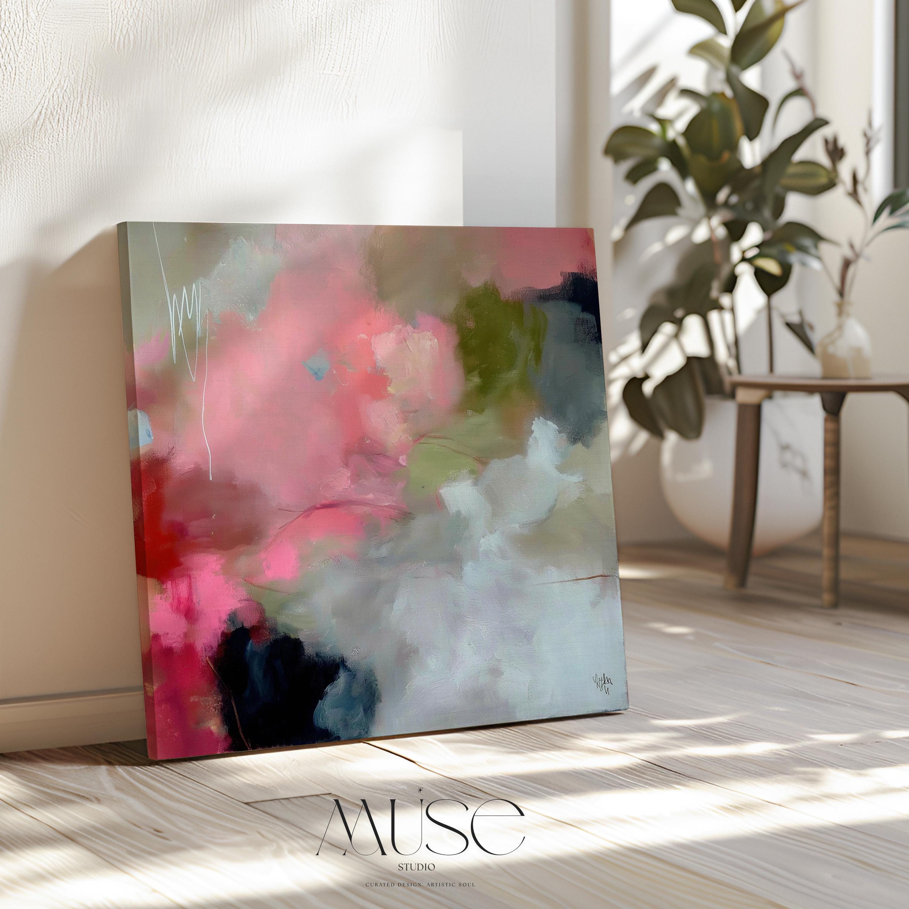Square abstract canvas artwork featuring coral pink, moss green, and soft ivory tones blended in painterly layers. Ideal for Soft Contemporary interiors, this warm and expressive design enhances dining rooms, living spaces, or offices with its organic flow and refined color balance. Printed on archival cotton-blend canvas and hand-stretched for a gallery-quality presentation.