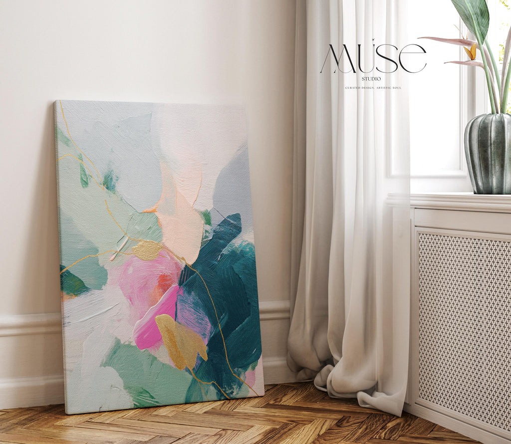 Vertical abstract canvas wall art featuring teal, blush pink, and gold accents with layered brush texture. Designed for transitional and modern interiors, this piece enhances bedrooms, hallways, or living rooms. Available framed or as a gallery-wrapped canvas for curated, designer-forward decor.