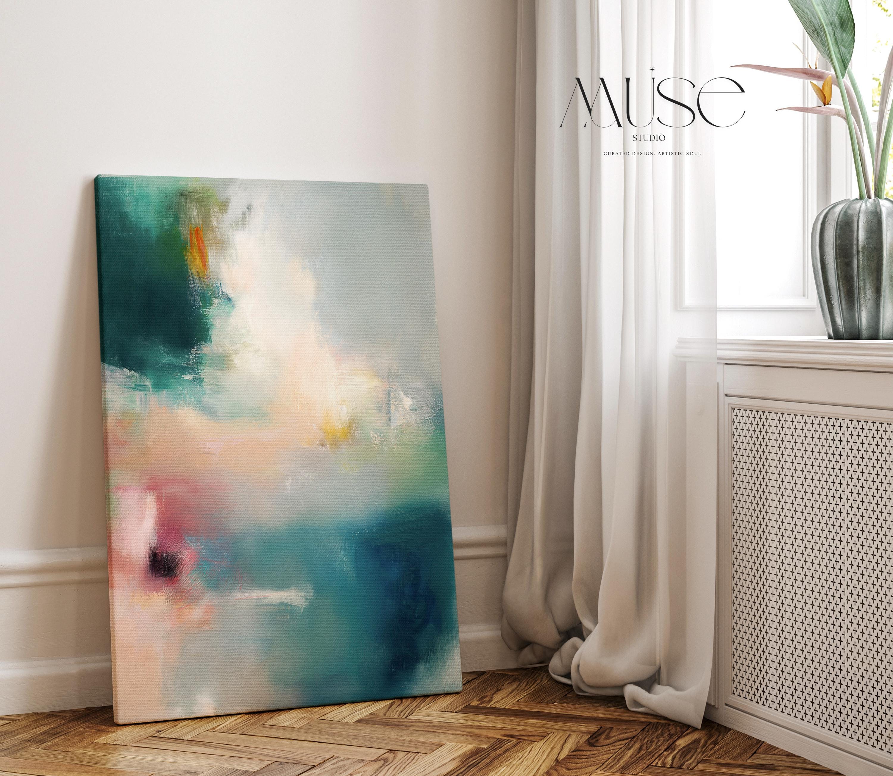 Large vertical abstract canvas wall art featuring teal, blush pink, and gold tones in layered brushstrokes. The soft coastal palette and luminous texture complement transitional, modern, and soft contemporary interiors. Available as a gallery-wrapped canvas in multiple sizes for curated, designer-forward decor.