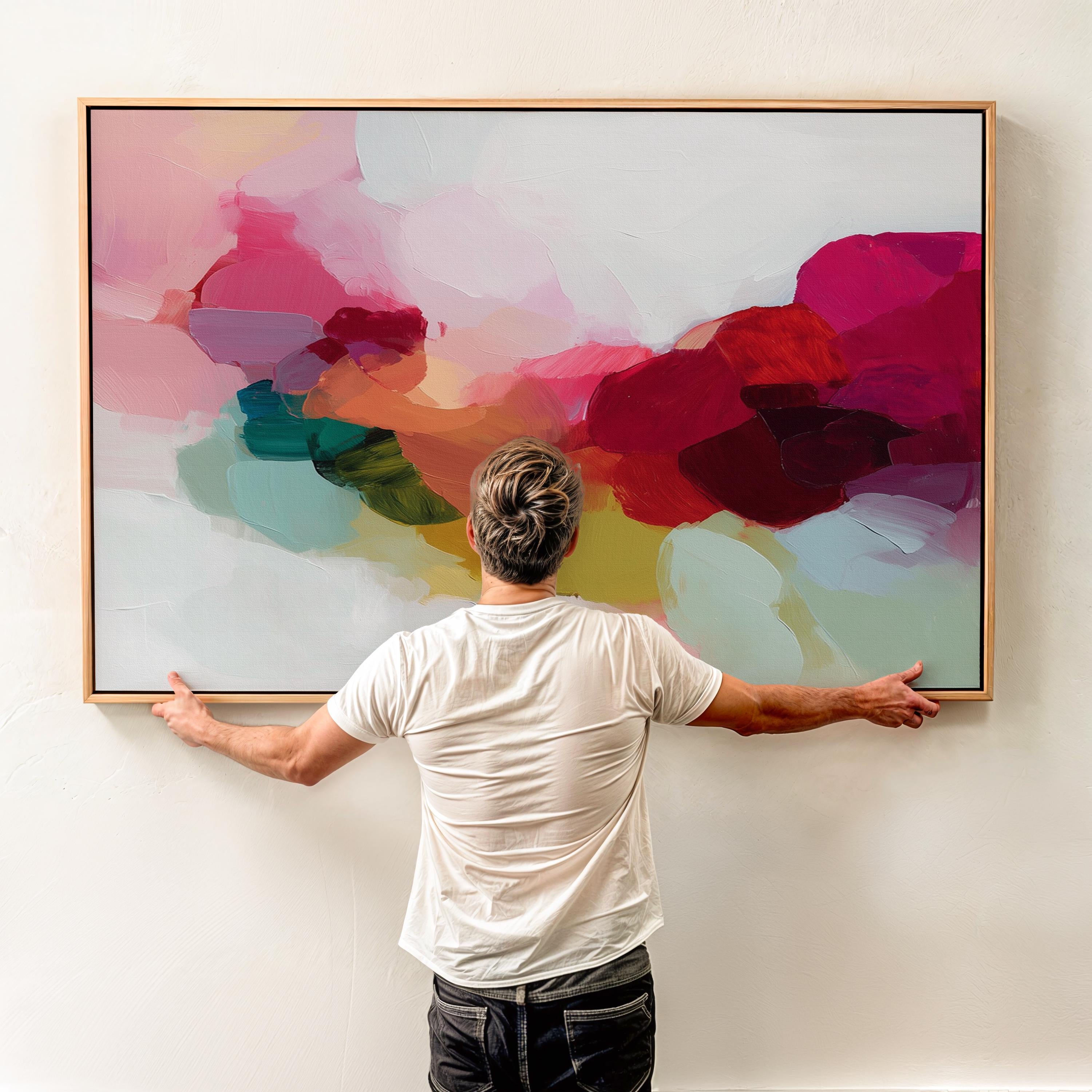 Horizontal framed abstract wall art featuring bold red, green, and blush pink tones in a softly layered composition. Perfect for Color Pop interiors, this expressive artwork brings warmth and personality to living rooms, dining rooms, or curated spaces. Floater framed in FSC-certified wood and printed on archival cotton-blend canvas for a refined, gallery-quality presentation.
