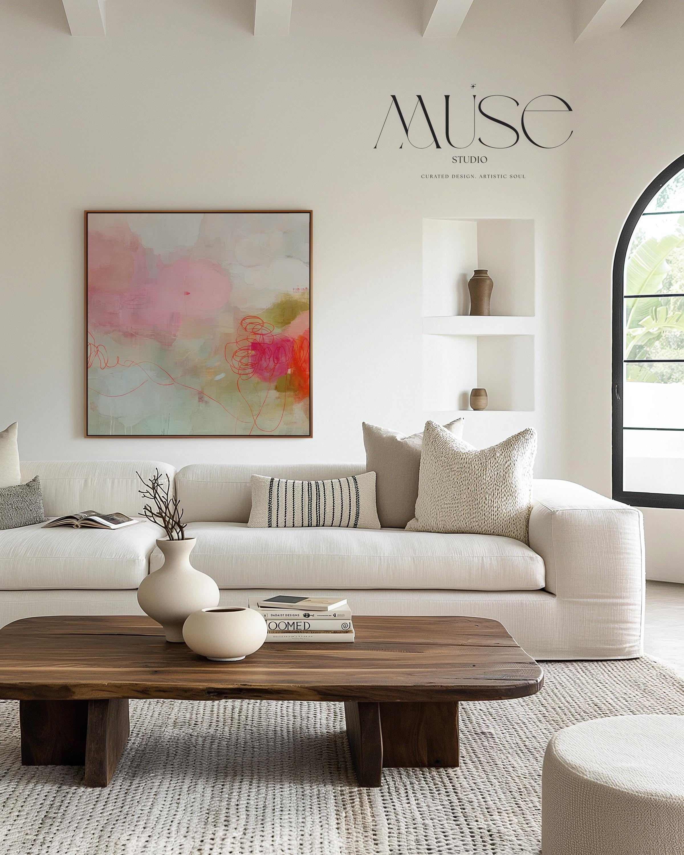Square abstract canvas wall art featuring blush pink, coral, and sage tones with expressive painterly details. This modern piece adds warmth and refined softness to living rooms, bedrooms, or minimalist interiors. Gallery-wrapped on premium cotton canvas, ready to hang for elevated home decor.