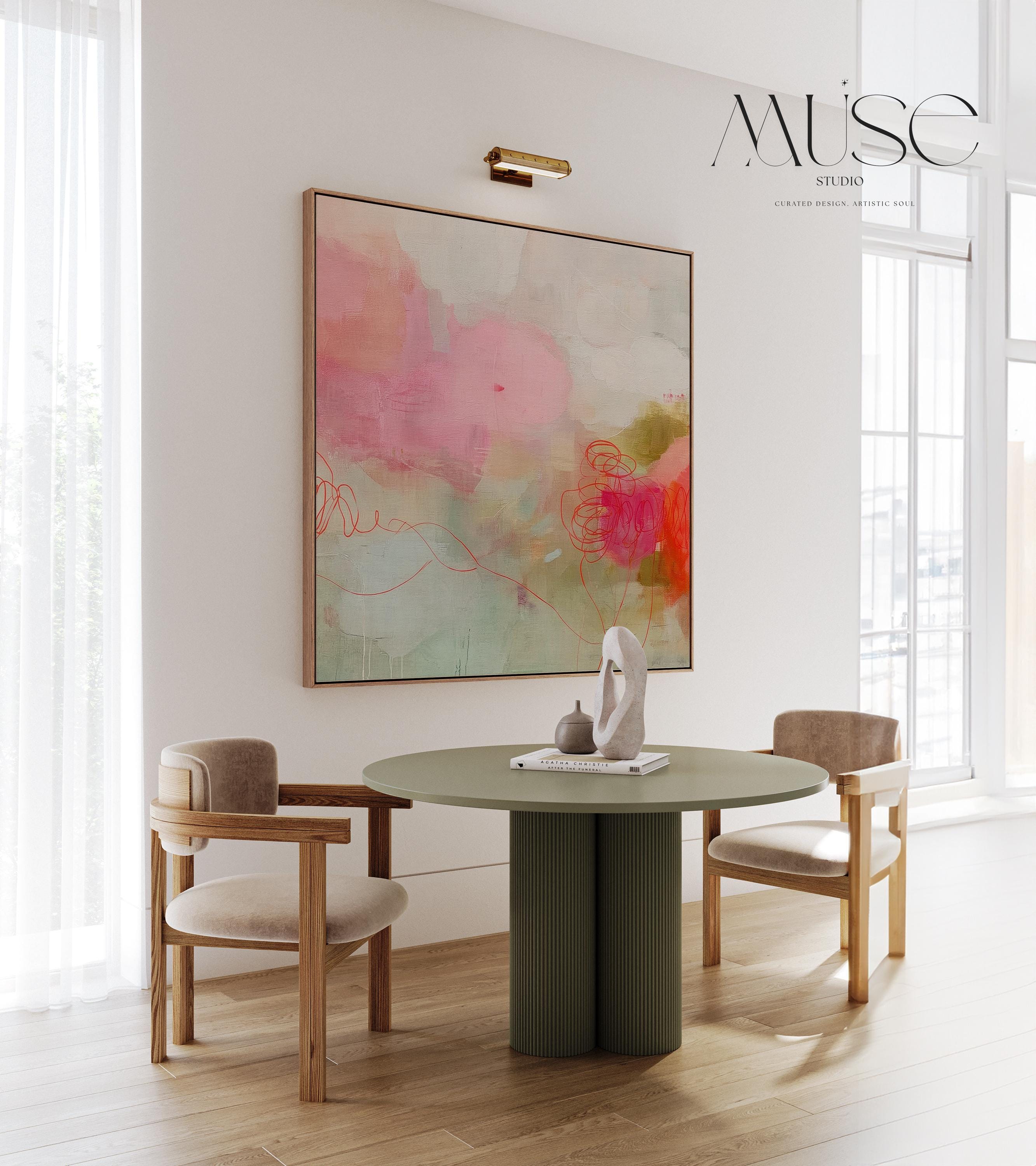 Square abstract canvas wall art featuring blush pink, coral, and sage tones with expressive painterly details. This modern piece adds warmth and refined softness to living rooms, bedrooms, or minimalist interiors. Gallery-wrapped on premium cotton canvas, ready to hang for elevated home decor.