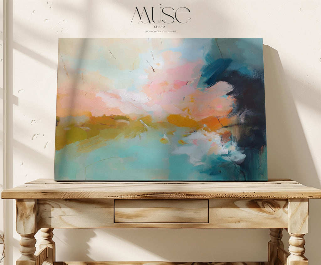 Abstract canvas wall art featuring sweeping teal, coral, and peach brushstrokes inspired by ocean light and coastal horizons. The horizontal composition radiates warmth and movement, ideal for living rooms or offices. Gallery-wrapped cotton canvas design offers a sleek, ready-to-hang presentation.