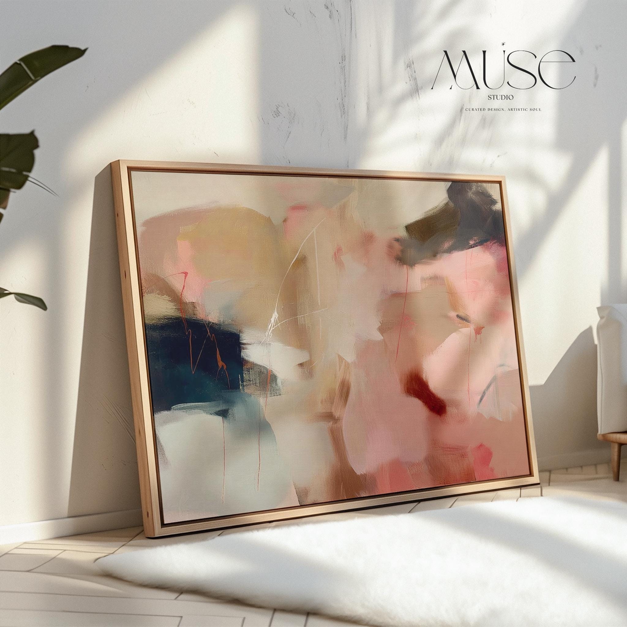 Elegant horizontal canvas wall art in soft blush, sand, and navy tones. Painterly layers flow across the surface, creating a calm yet expressive movement that complements Warm Neutral and Soft Contemporary interiors. Ideal above a sofa or reading chair for a curated, design-forward finish. Hand-crafted fine art giclée on cotton canvas.