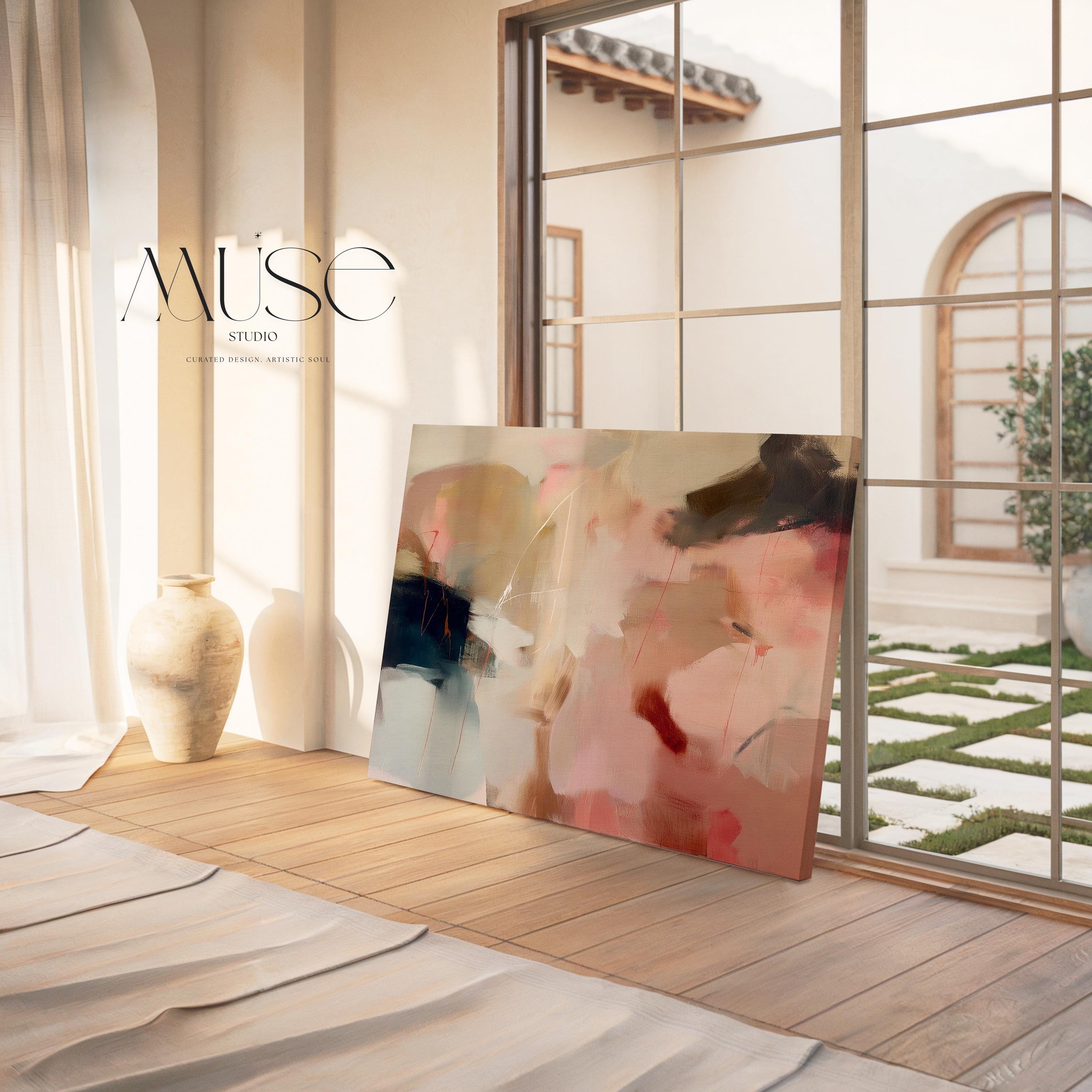 Horizontal abstract canvas wall art featuring blush pink, beige, and navy tones. Soft layered brushwork creates a refined, tranquil feel perfect for warm minimalist or transitional interiors. Styled for living rooms, bedrooms, or entryways, this artwork adds calm sophistication to any decor. Available as a gallery-wrapped canvas wall art, framed canvas, or fine art poster print.
