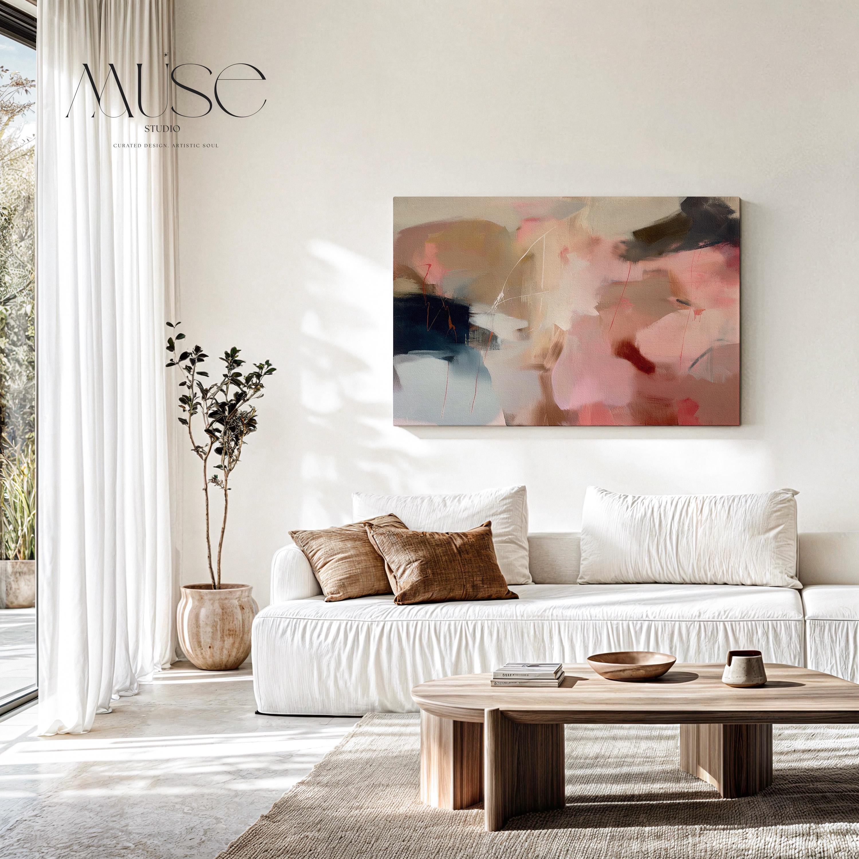 Horizontal abstract canvas wall art featuring blush pink, beige, and navy tones. Soft layered brushwork creates a refined, tranquil feel perfect for warm minimalist or transitional interiors. Styled for living rooms, bedrooms, or entryways, this artwork adds calm sophistication to any decor. Available as a gallery-wrapped canvas wall art, framed canvas, or fine art poster print.