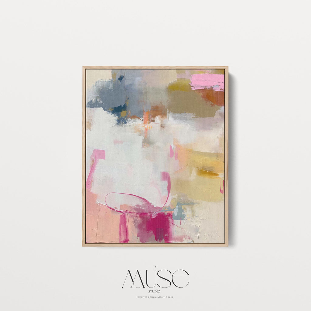 Vertical abstract canvas wall art featuring blush pink, gold, taupe, and soft blue hues in a soft contemporary color pop palette. The artwork adds warmth and elegance to modern interiors, perfect for living rooms, bedrooms, or entryways. Its layered brushwork and inviting tones create a sophisticated, designer look. Available as a gallery-wrapped canvas, framed canvas, or fine art poster print.