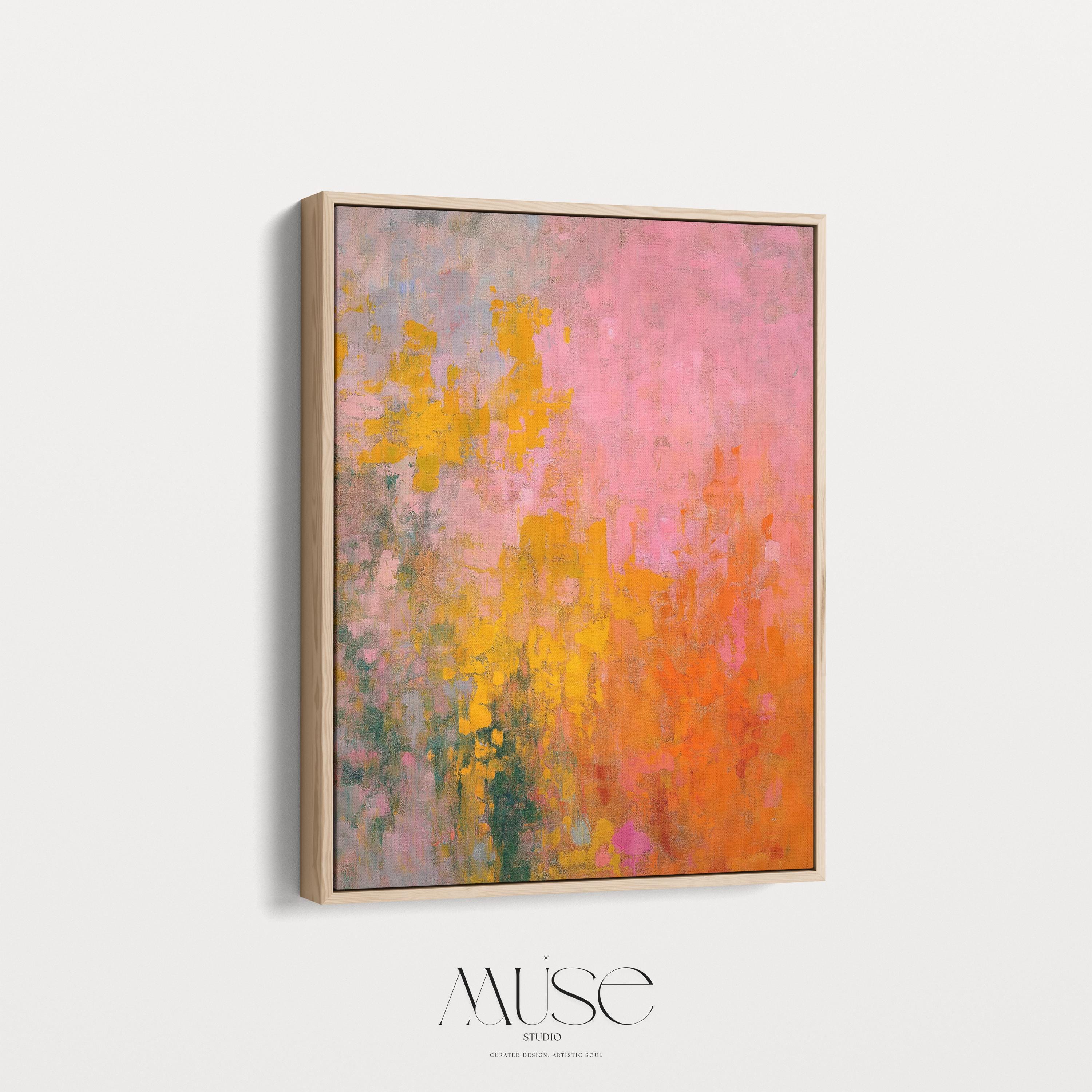 Large colorful abstract canvas wall art in pink, orange, and yellow tones with painterly brushwork. A bold, energetic statement piece for modern or transitional living room decor. Available as gallery-wrapped or framed canvas for premium interior design styling.