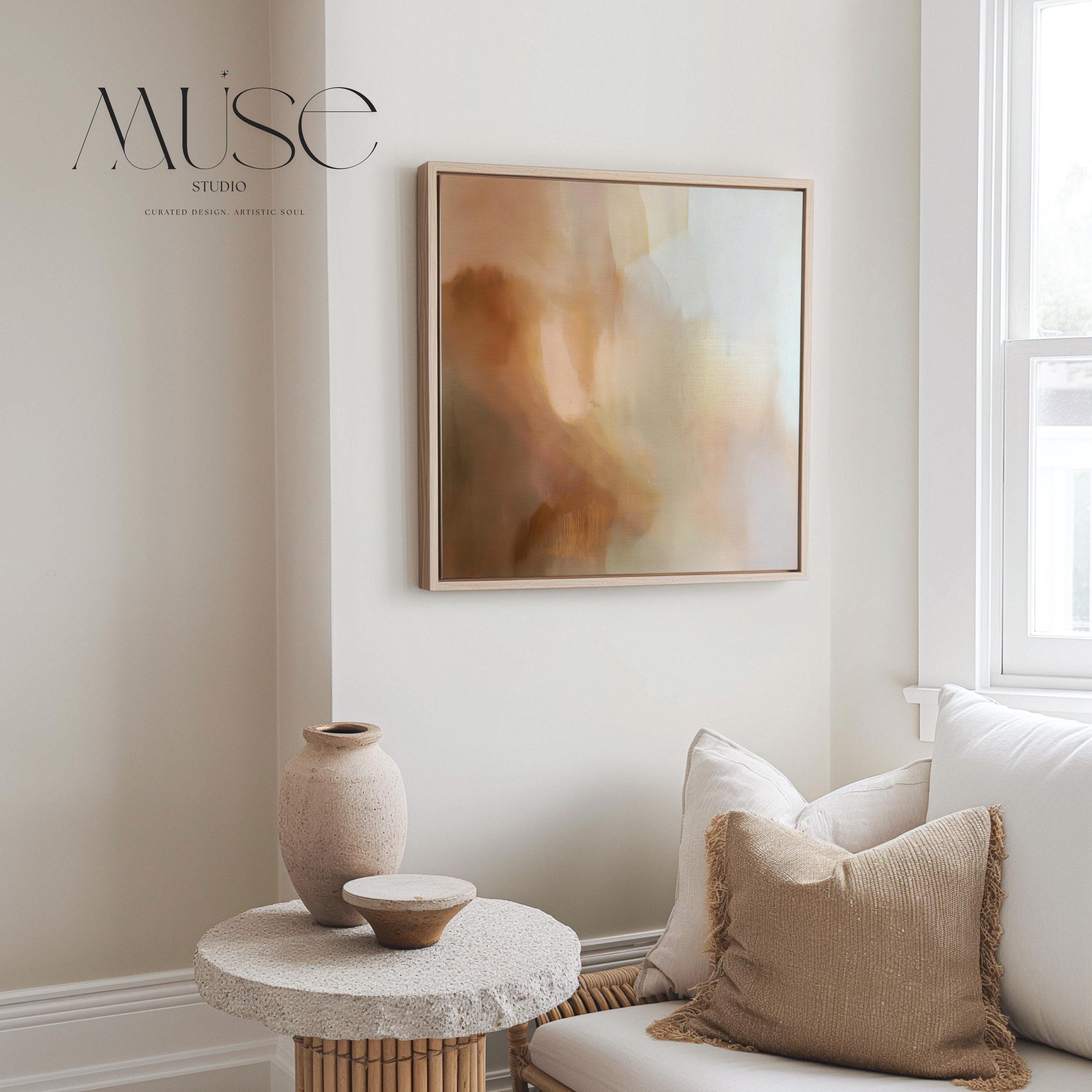 Large warm minimal abstract canvas wall art in beige, brown, and cream hues. Soft painterly transitions create a soothing, elegant statement perfect for minimalist or transitional living room decor. Available as gallery-wrapped or framed canvas for timeless interior styling.
