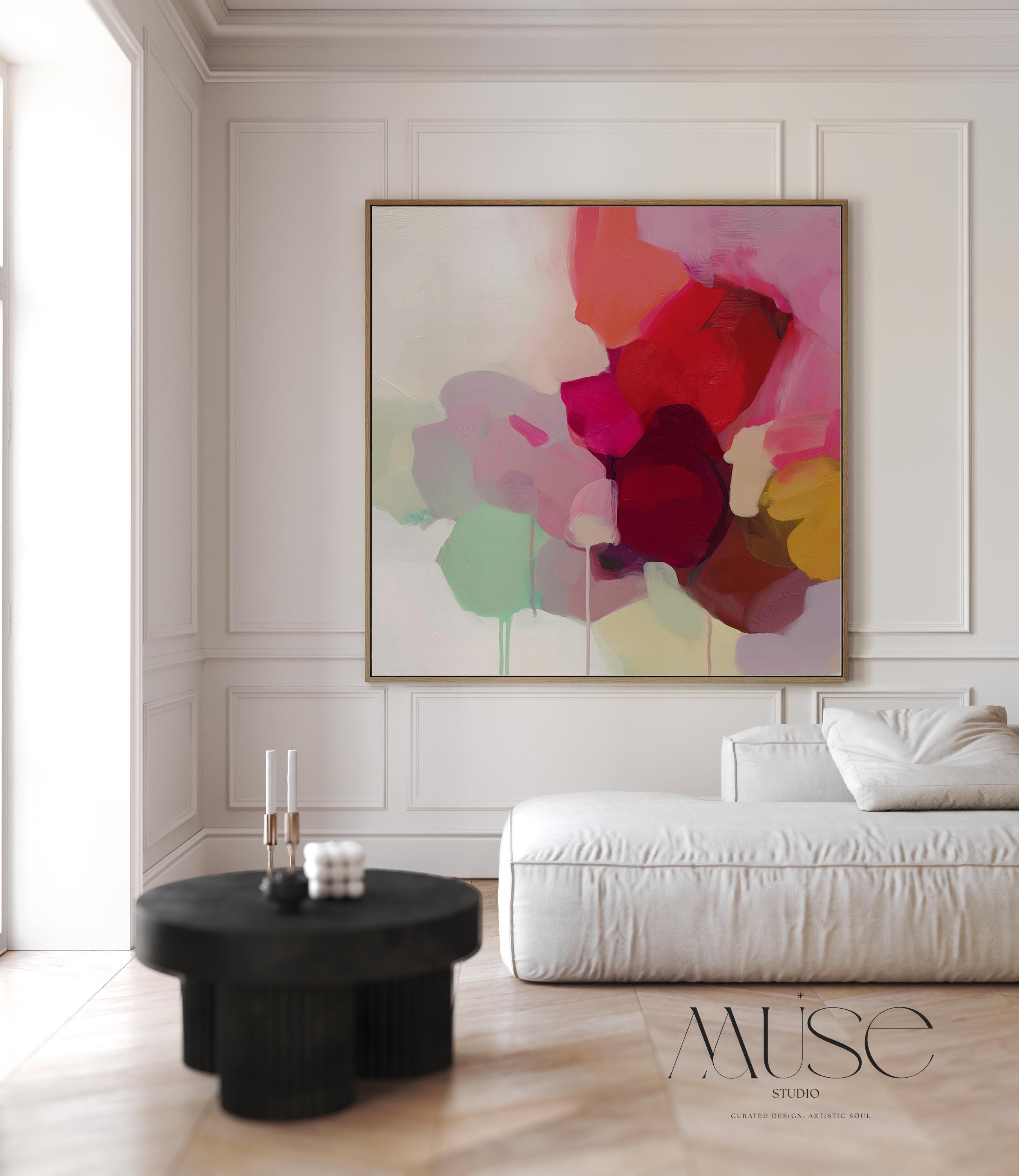 Large square abstract wall art in vivid red, pink, plum, and green hues with layered brushwork and soft tonal transitions. Designed for Color Pop interiors, this vibrant canvas creates a statement centerpiece in living rooms or modern spaces. Gallery-wrapped canvas wall art with fine texture and a clean, frameless presentation, ready to hang and elevate any room with bright, joyful color.