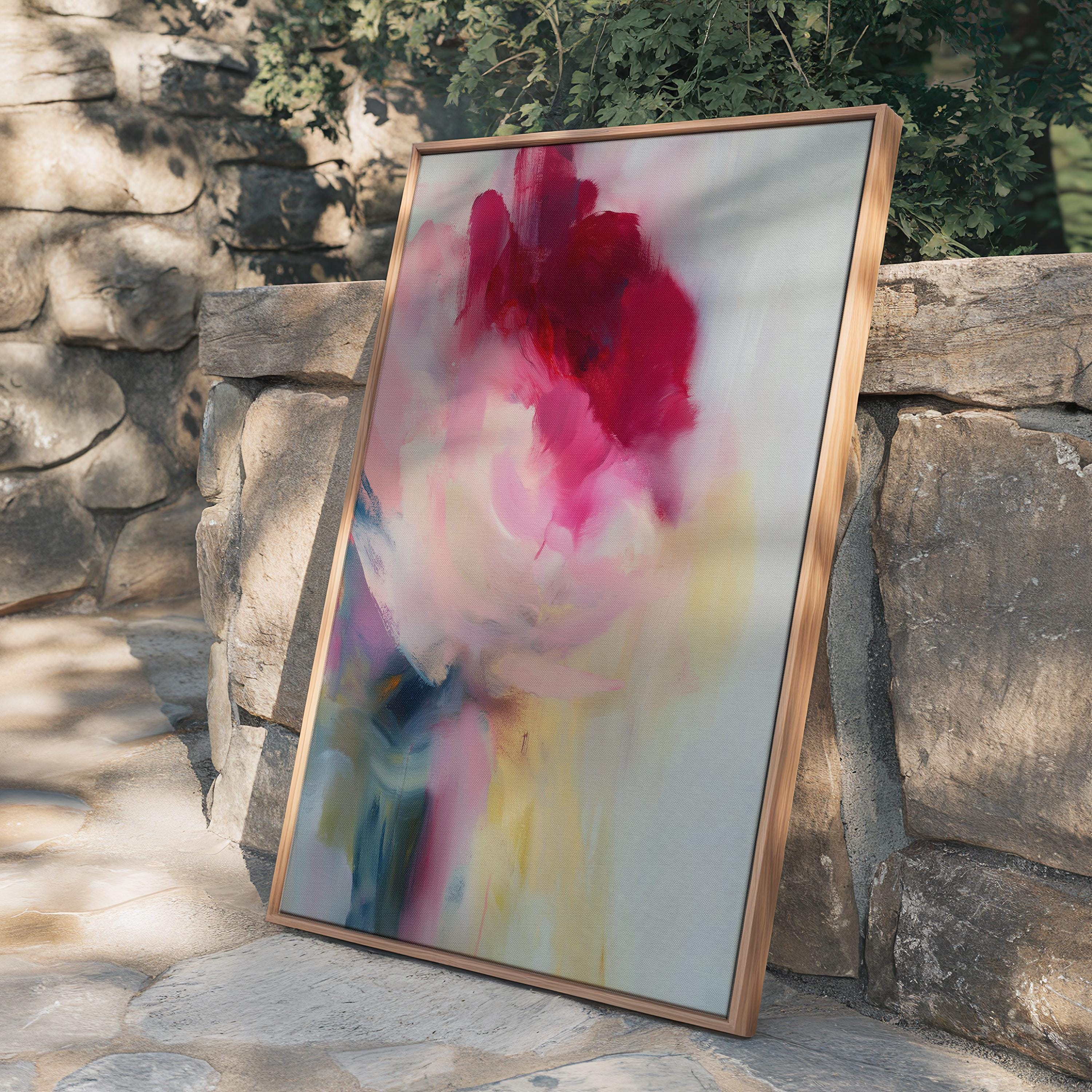 Vertical abstract wall art in soft pink, rose, and misty blue tones, blending painterly layers with an airy, luminous finish. Ideal for bedrooms or entryways, this soft contemporary design adds tranquility and subtle color. Floater framed in FSC-certified wood with a natural finish, printed on archival cotton-blend canvas for premium wall decor.