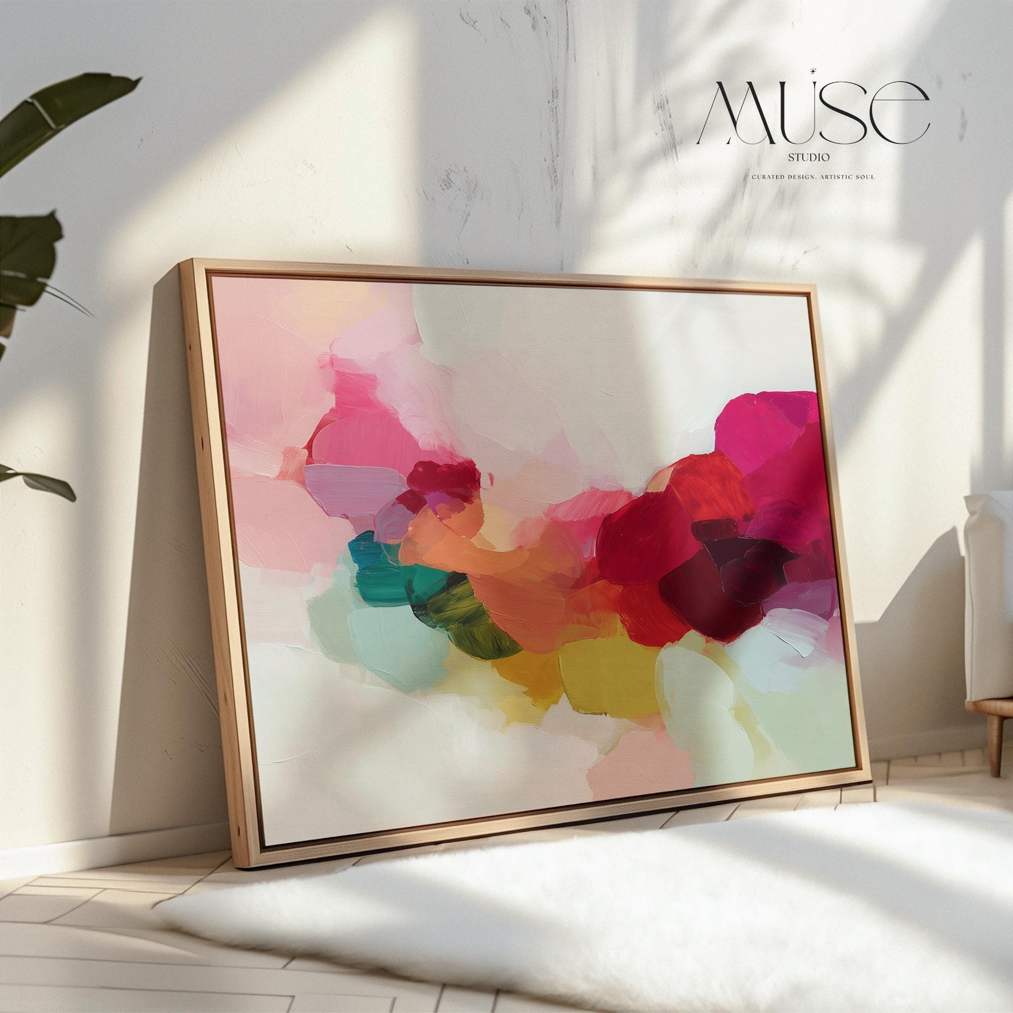 Horizontal framed abstract wall art featuring bold red, green, and blush pink tones in a softly layered composition. Perfect for Color Pop interiors, this expressive artwork brings warmth and personality to living rooms, dining rooms, or curated spaces. Floater framed in FSC-certified wood and printed on archival cotton-blend canvas for a refined, gallery-quality presentation.