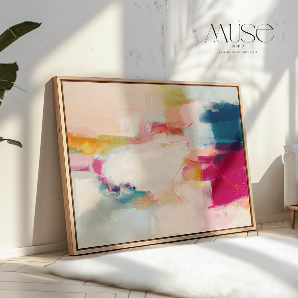 Horizontal framed abstract wall art featuring pink, blue, and golden hues in a softly blended composition. Ideal for Soft Contemporary interiors, this elegant piece brings warmth and sophistication to living rooms, offices, or designer-curated spaces. Floater framed in FSC-certified wood and printed on archival cotton-blend canvas for a premium gallery-quality finish.