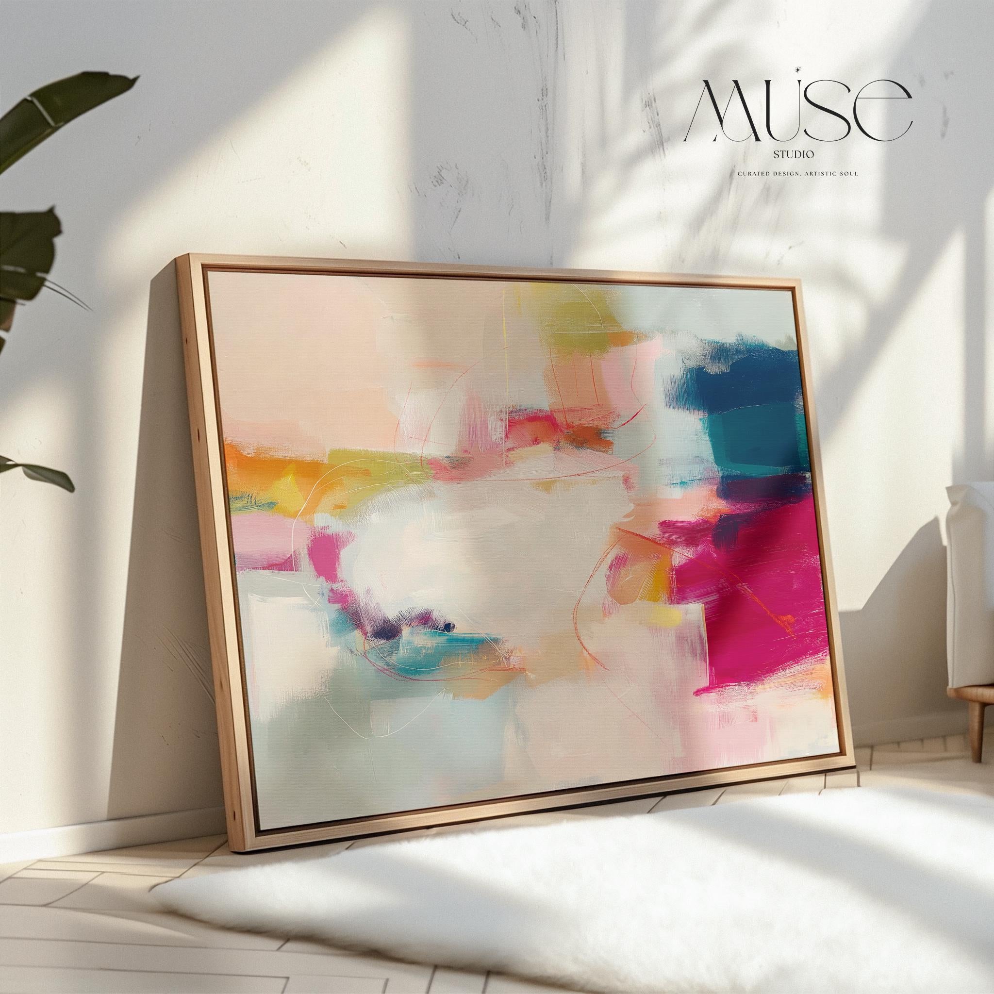 Horizontal framed abstract wall art featuring pink, blue, and golden hues in a softly blended composition. Ideal for Soft Contemporary interiors, this elegant piece brings warmth and sophistication to living rooms, offices, or designer-curated spaces. Floater framed in FSC-certified wood and printed on archival cotton-blend canvas for a premium gallery-quality finish.
