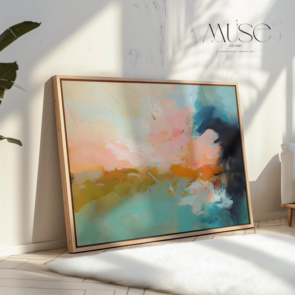 Horizontal framed abstract artwork featuring soft turquoise, peach, and gold tones inspired by ocean horizons. Ideal for Coastal Horizon interiors, this piece brings calm energy and warmth to living rooms, beach houses, or modern spaces. Printed on archival cotton-blend canvas, hand-stretched, and framed in natural wood for a refined, gallery-quality finish.