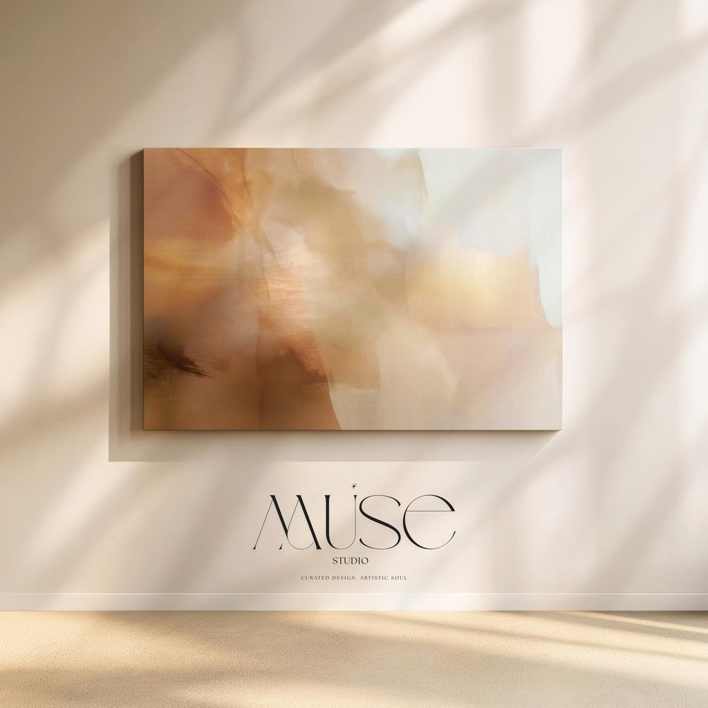 Horizontal warm-neutral abstract wall art in beige, sand, and ivory tones, styled in a warm minimal interior with light wood and linen textures. Available as framed canvas or gallery canvas by Muse Studio.