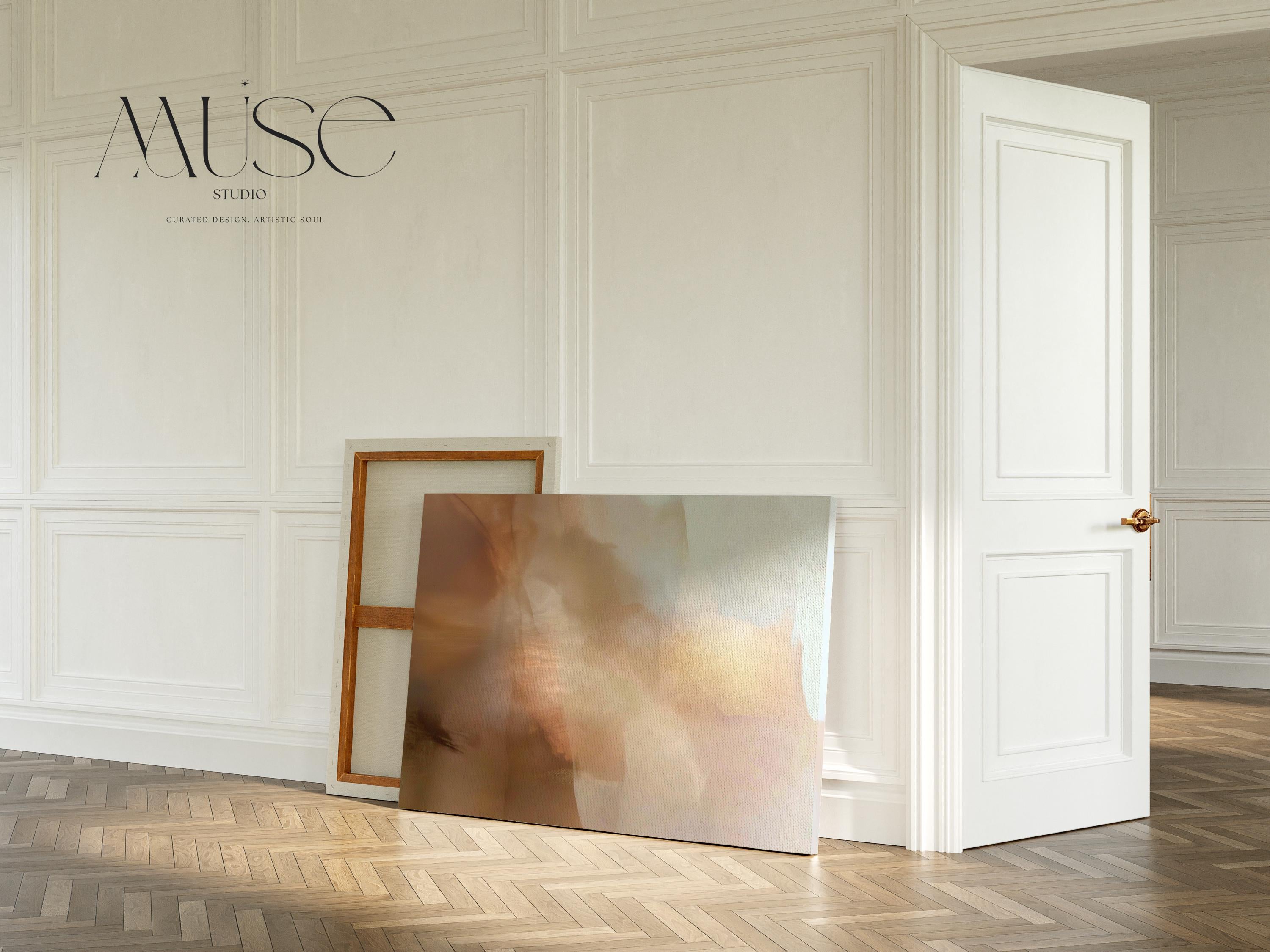Horizontal warm-neutral abstract wall art in beige, sand, and ivory tones, styled in a warm minimal interior with light wood and linen textures. Available as framed canvas or gallery canvas by Muse Studio.