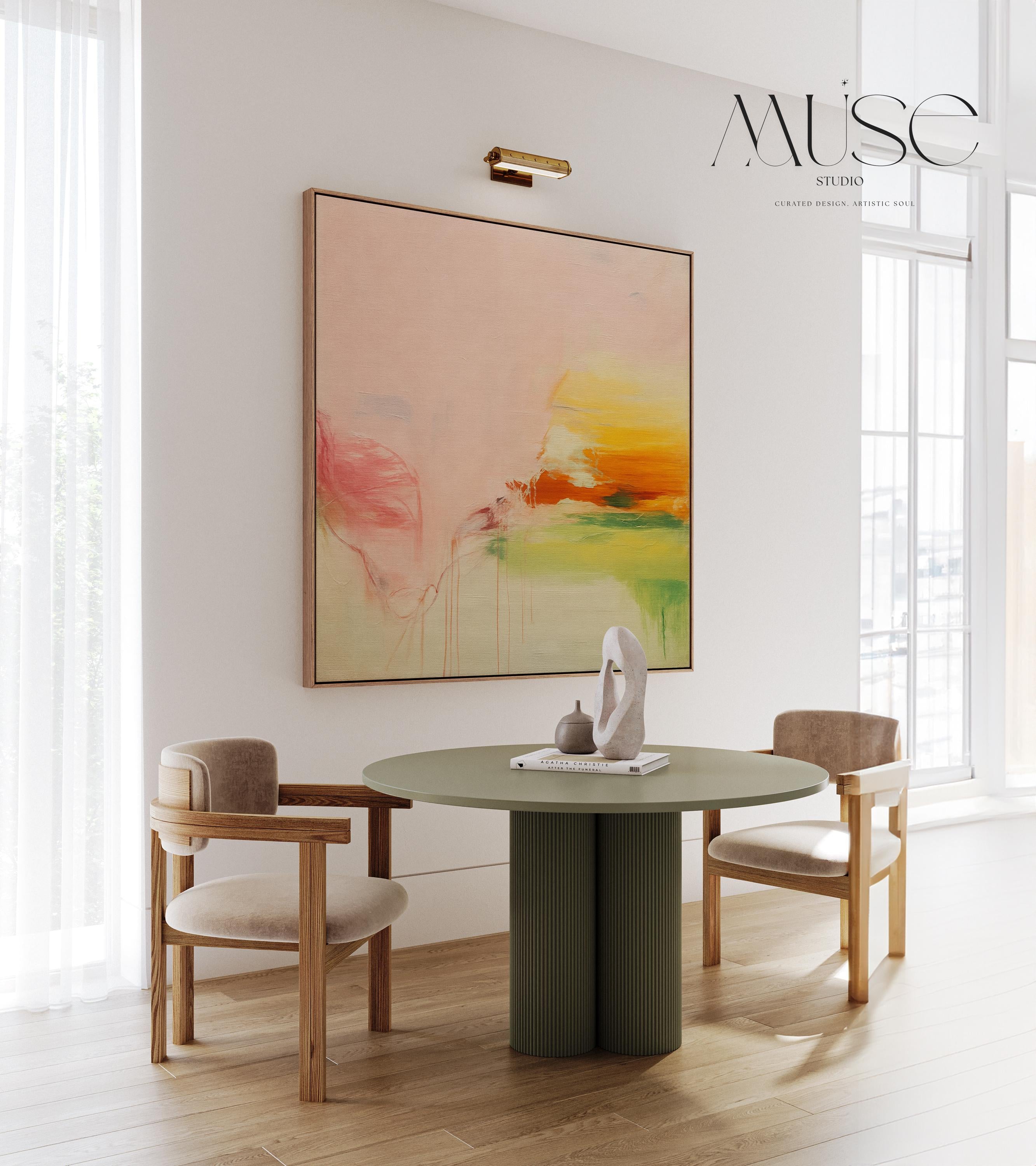 Square abstract wall art in blush pink, soft peach, golden ochre, and fresh green tones, featuring gentle painterly blends and subtle drips. Styled in a natural wood floater frame, the piece reflects soft contemporary and warm minimal design, ideal for bedrooms, living rooms, or calming modern interiors. Gallery-wrapped framed canvas by Muse Studio.