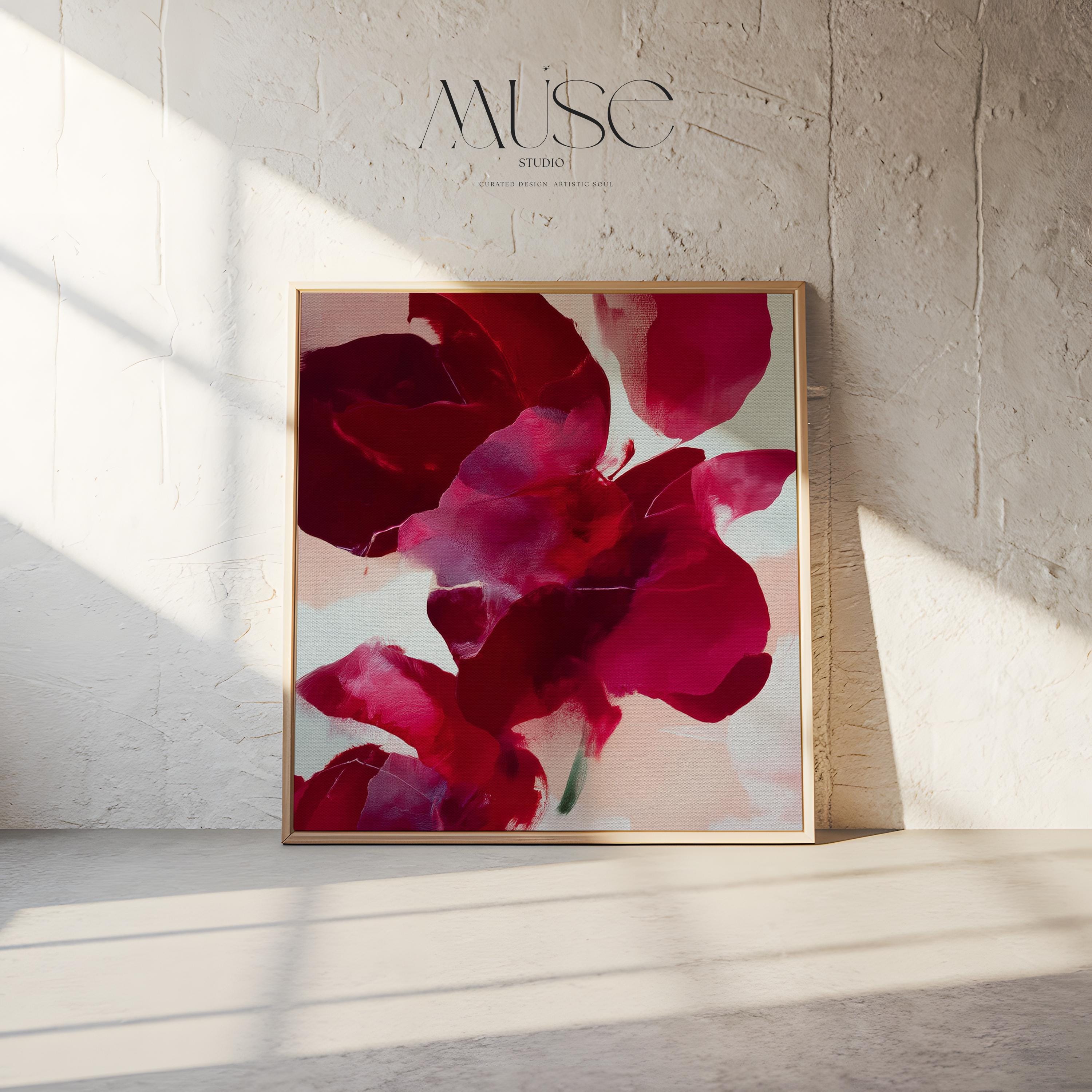 poinsettia-inspired abstract wall art in deep red, berry, and blush tones on framed canvas. Bold holiday color pop style with soft painterly texture. Ideal for Christmas entryway, dining room, or winter living room decor. Premium framed canvas artwork by Muse Studio.