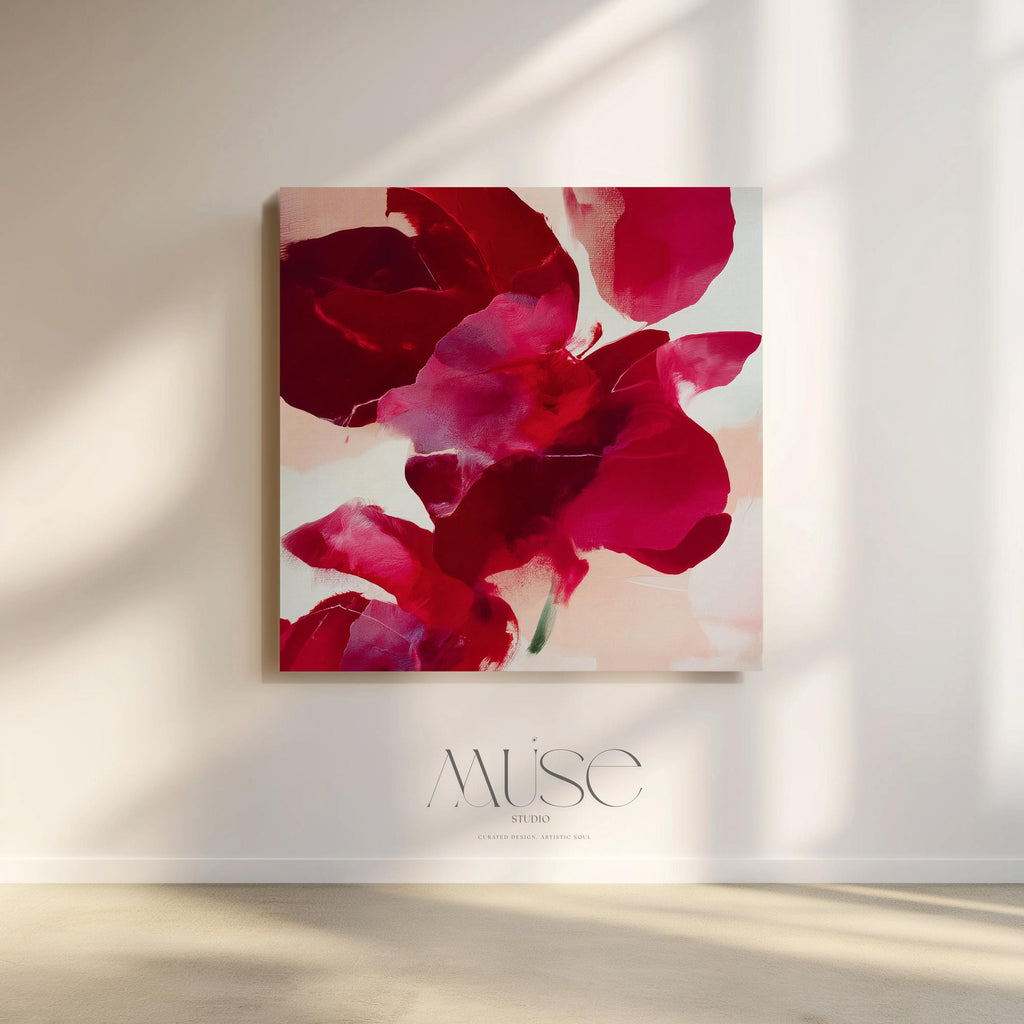 Square abstract holiday canvas featuring deep crimson, berry, and blush painterly petals with soft blended edges. Color-pop seasonal wall art in a warm minimalist style, ideal for Christmas living rooms, winter bedrooms, or festive entryways. Premium gallery-wrapped canvas by Muse Studio.