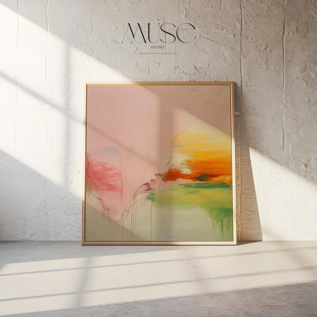 Square abstract wall art in blush pink, soft peach, golden ochre, and fresh green tones, featuring gentle painterly blends and subtle drips. Styled in a natural wood floater frame, the piece reflects soft contemporary and warm minimal design, ideal for bedrooms, living rooms, or calming modern interiors. Gallery-wrapped framed canvas by Muse Studio.