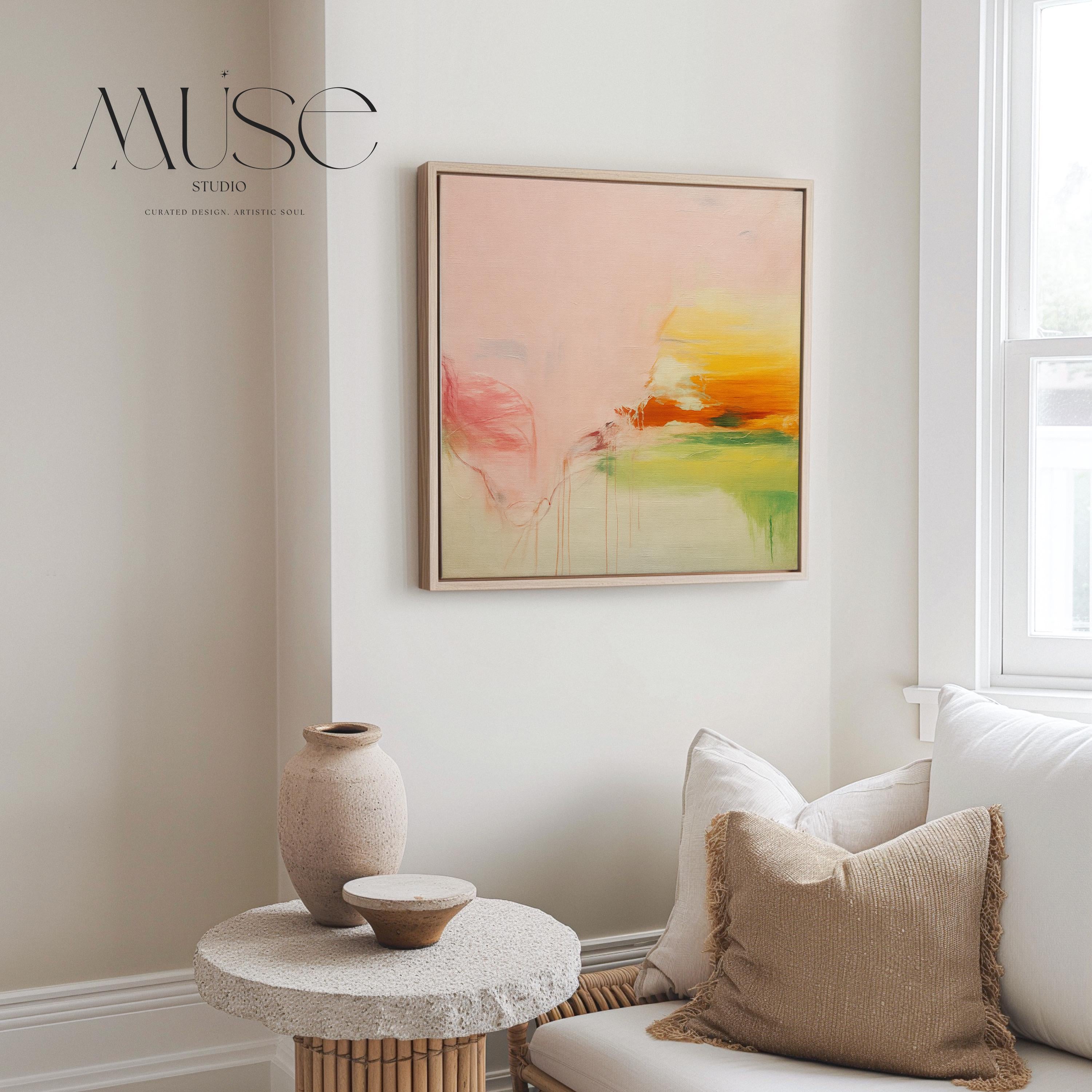 Square abstract wall art in blush pink, soft peach, golden ochre, and fresh green tones, featuring gentle painterly blends and subtle drips. Styled in a natural wood floater frame, the piece reflects soft contemporary and warm minimal design, ideal for bedrooms, living rooms, or calming modern interiors. Gallery-wrapped framed canvas by Muse Studio.