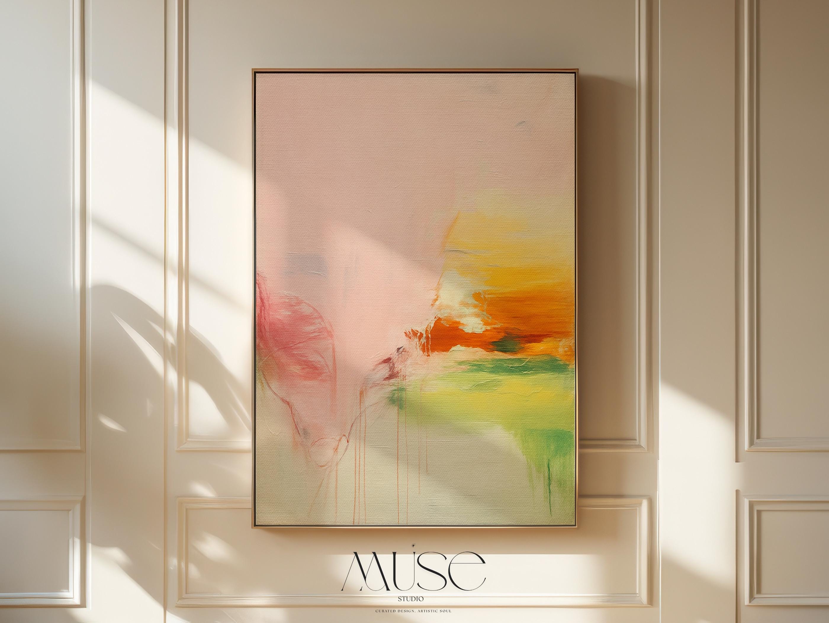 Vertical framed abstract wall art in blush, peach, and golden tones with soft contemporary and warm neutral styling. Features subtle pastel transitions, ideal for bedrooms, living rooms, or wellness interiors. Premium floater framed canvas by Muse Studio.