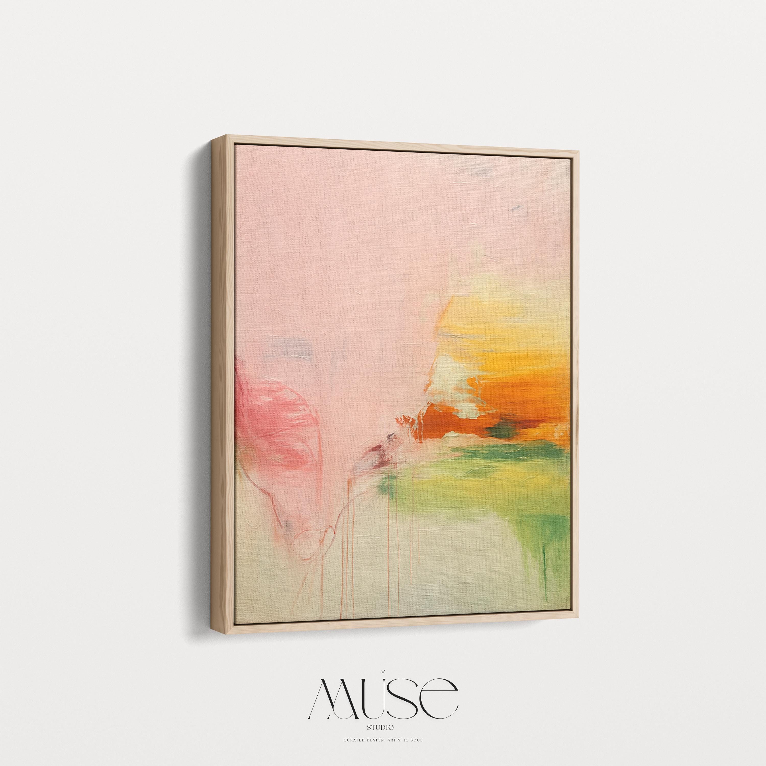 Vertical framed abstract wall art in blush, peach, and golden tones with soft contemporary and warm neutral styling. Features subtle pastel transitions, ideal for bedrooms, living rooms, or wellness interiors. Premium floater framed canvas by Muse Studio.