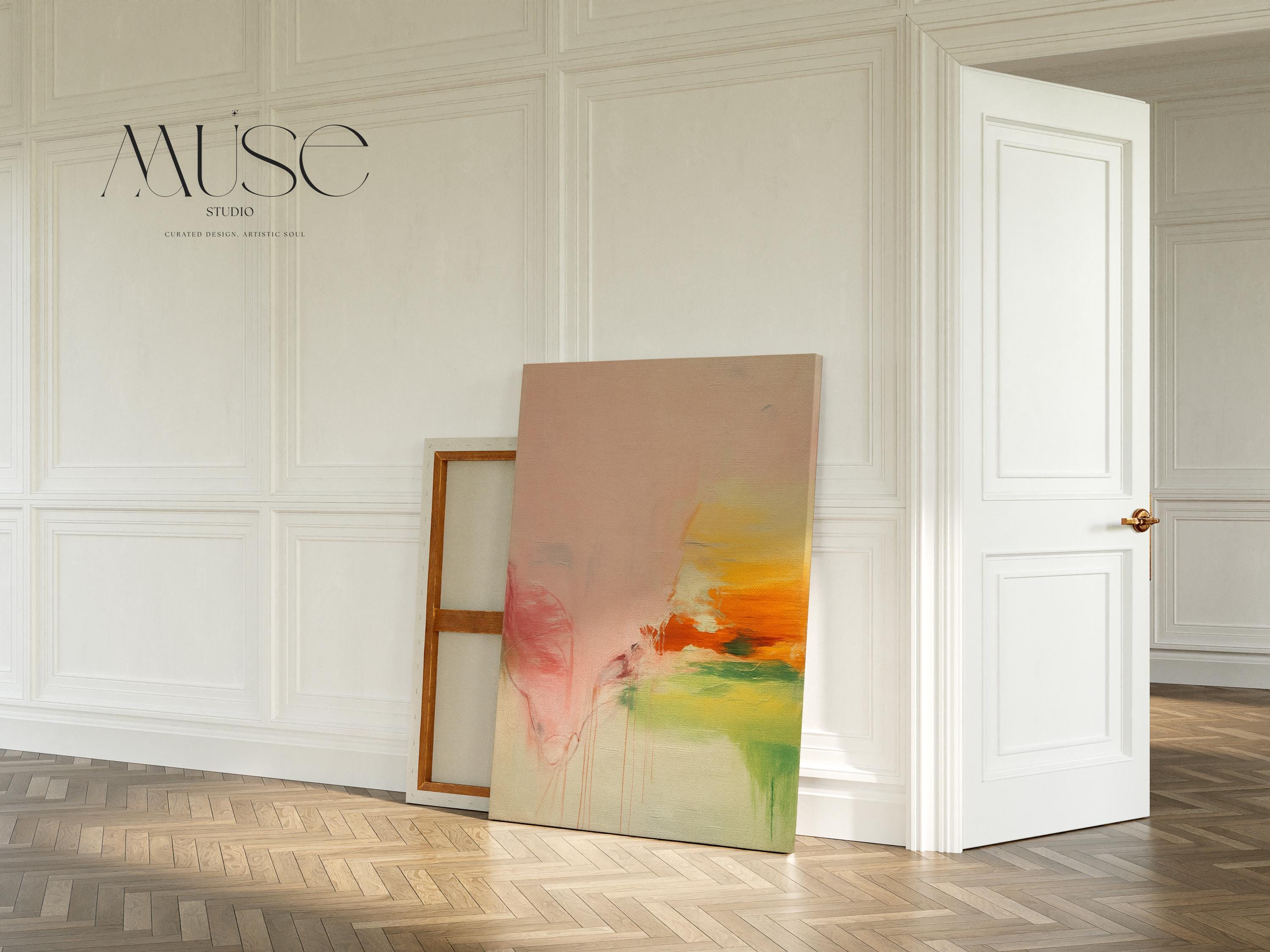 Vertical abstract canvas wall art in blush, peach, and golden pastel tones with soft modern preppy styling. Gentle blends and airy color transitions make it ideal for feminine bedrooms, pastel-inspired interiors, and bright modern spaces. Available as gallery-wrapped or floater framed canvas by Muse Studio.