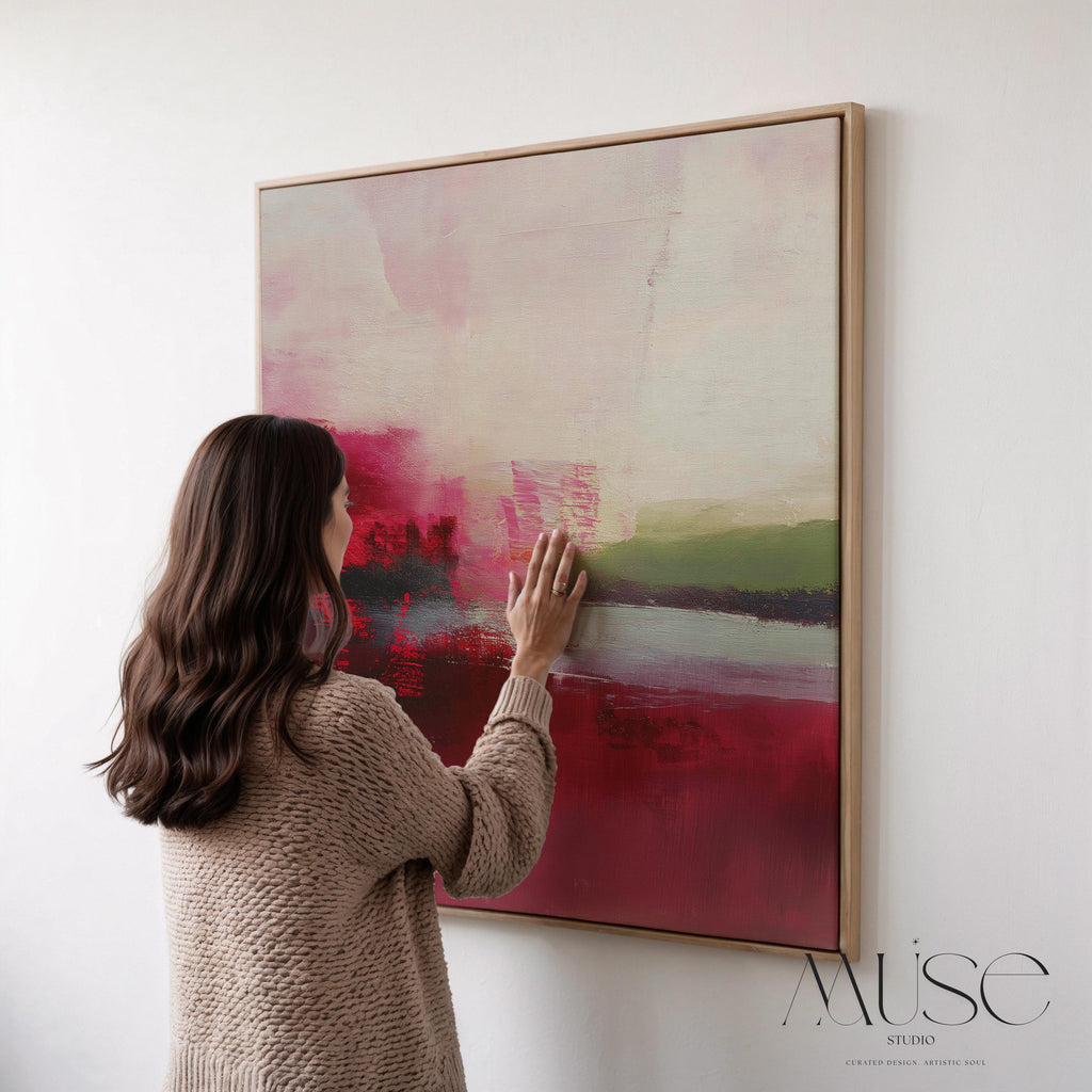 Framed cranberry and blush pink abstract canvas with soft winter tones of sage and red. Warm minimalist holiday wall art for living rooms, bedrooms, dining rooms, and seasonal interiors. Limited edition Muse Studio artwork, MUSE 611.