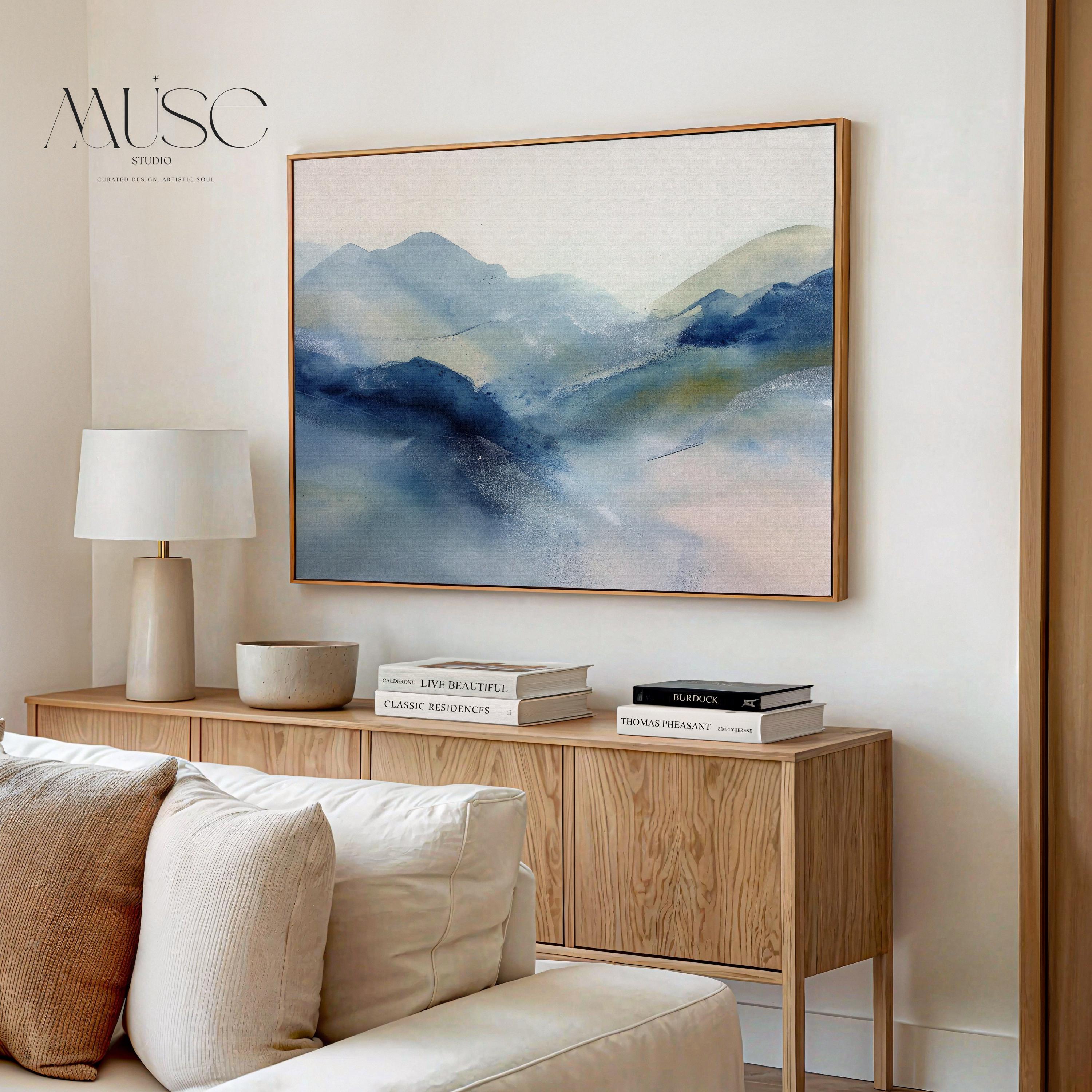 Framed alpine blue and winter white abstract canvas with soft snowy tones. Minimalist winter wall art for ski lodges, coastal cabins, bedrooms, or living rooms. Winter Whites Collection by Muse Studio, MUSE 621.